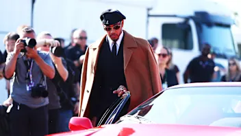 MONZA, ITALY - SEPTEMBER 03: Lewis Hamilton of Great Britain and Scuderia Ferrari arrives at the