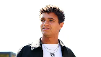 MONZA, ITALY - SEPTEMBER 03: Lando Norris of Great Britain and McLaren arrives in the Paddock