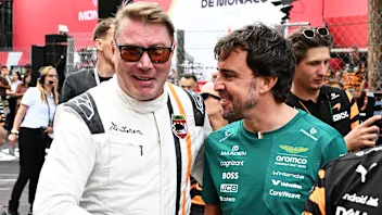 MONTE-CARLO, MONACO - JUNE 04: Mika Hakkinen and Fernando Alonso of Spain and Aston Martin F1 Team