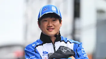 ZANDVOORT, NETHERLANDS - AUGUST 23: Yuki Tsunoda of Japan and Visa Cash App Racing Bulls arrives in