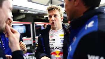 ZANDVOORT, NETHERLANDS - AUGUST 21: Liam Lawson of New Zealand and Oracle Red Bull Racing talks in