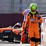 BAKU, AZERBAIJAN - SEPTEMBER 26: Lando Norris of Great Britain and McLaren looks dejected after