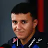 KUALA LUMPUR, MALAYSIA - OCTOBER 01: Isack Hadjar of France and Oracle Red Bull Racing talks to the