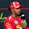 KUALA LUMPUR, MALAYSIA - OCTOBER 03: Second placed qualifier Lewis Hamilton of Great Britain and