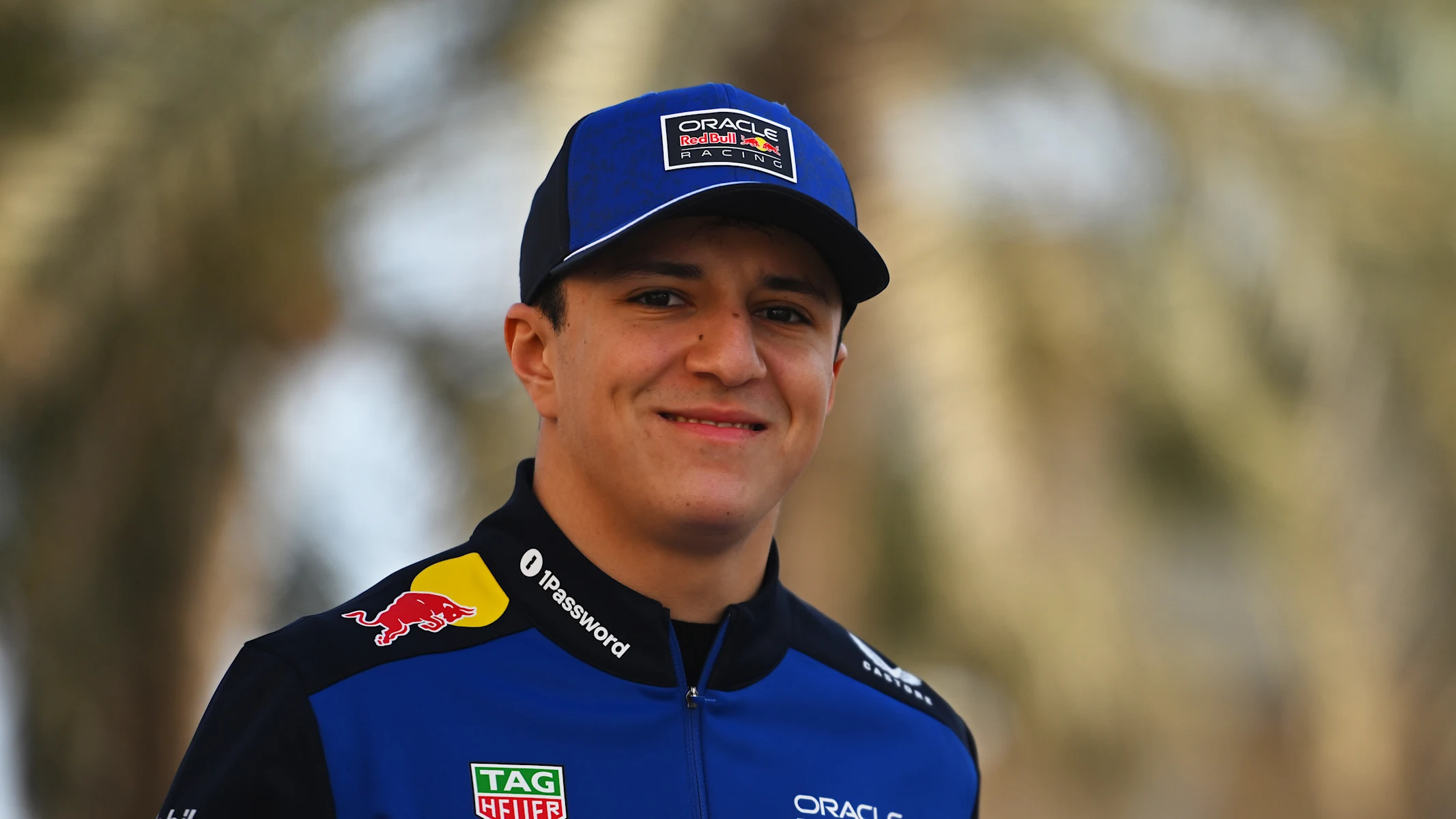 BAHRAIN, BAHRAIN - FEBRUARY 11: Isack Hadjar of France and Oracle Red Bull Racing walks in the