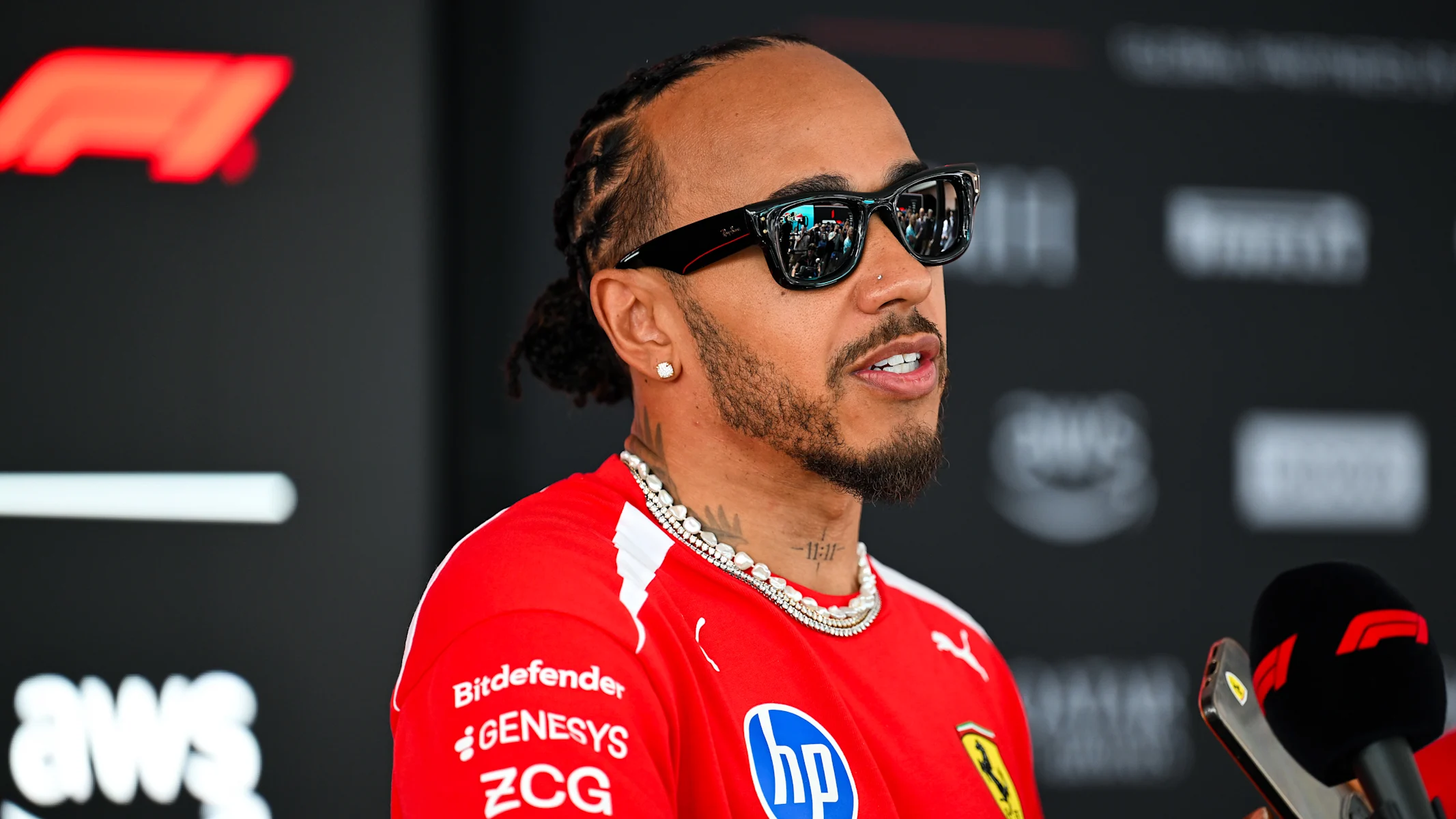 MONTE-CARLO, MONACO - JUNE 04: Lewis Hamilton of Great Britain and Scuderia Ferrari talks to the