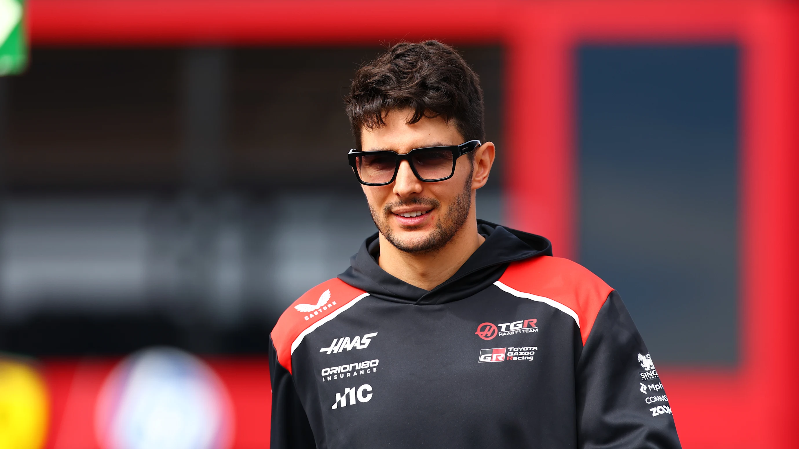 MADRID, SPAIN - SEPTEMBER 10: Esteban Ocon of France and Haas F1 walks in the Paddock during