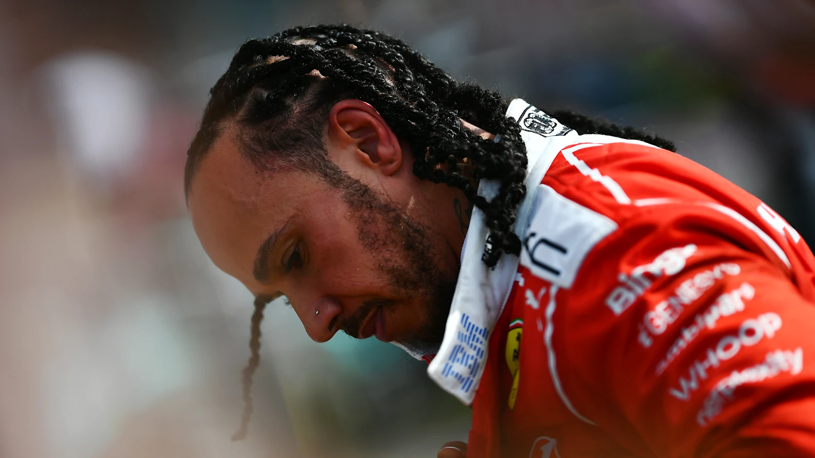 NORTHAMPTON, ENGLAND - JULY 05: Third placed Lewis Hamilton of Great Britain and Scuderia Ferrari