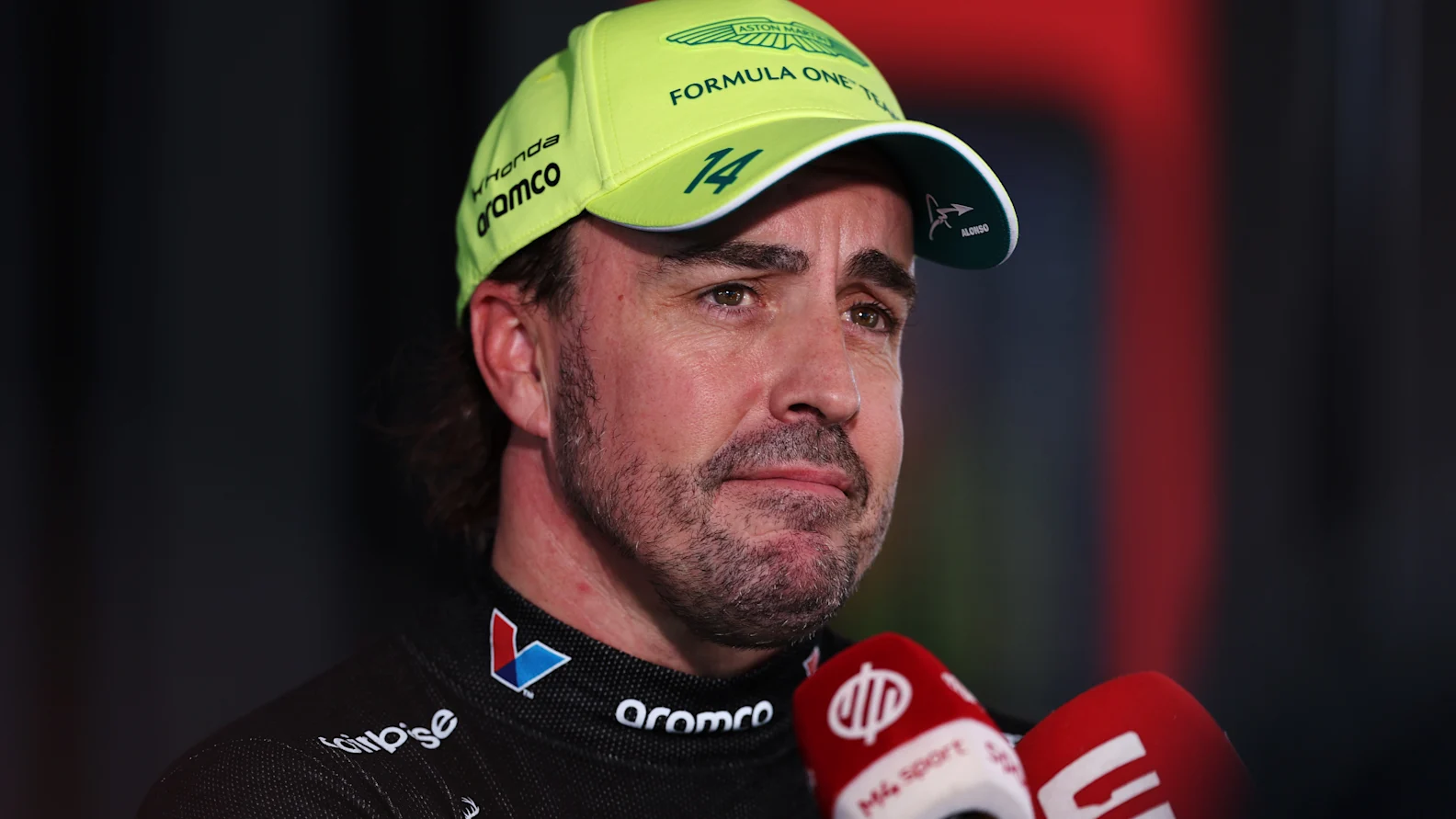 BUDAPEST, HUNGARY - JULY 25: Sixteenth placed qualifier Fernando Alonso of Spain and Aston Martin