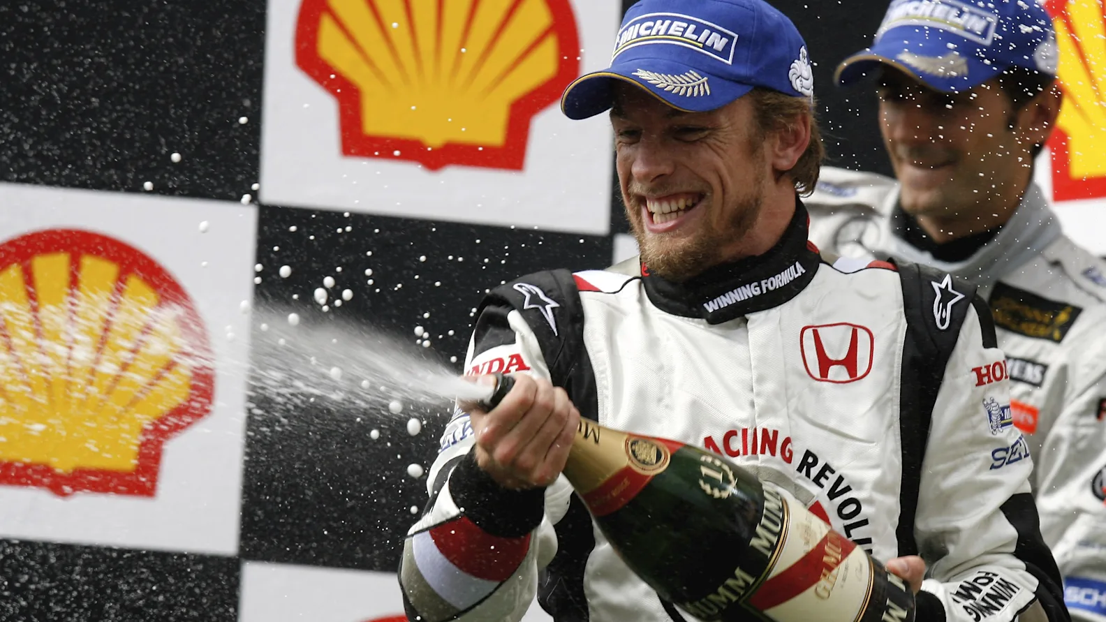 BUDAPEST, HUNGARY - AUGUST 06: Jenson Button of Great Britain and Honda Racing celebrates on the