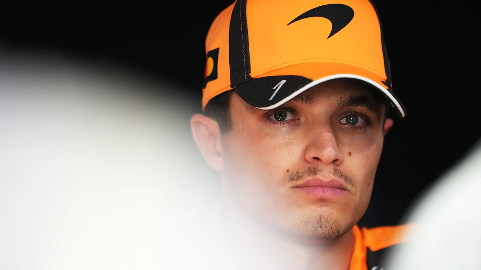 AUSTIN, TEXAS - OCTOBER 24: Eighth placed qualifier Lando Norris of Great Britain and McLaren is interviewed during qualifying ahead of the F1 Grand Prix of United States at Circuit of The Americas on October 24, 2026 in Austin, Texas. (Photo by Alex Bierens de Haan/LAT Images)