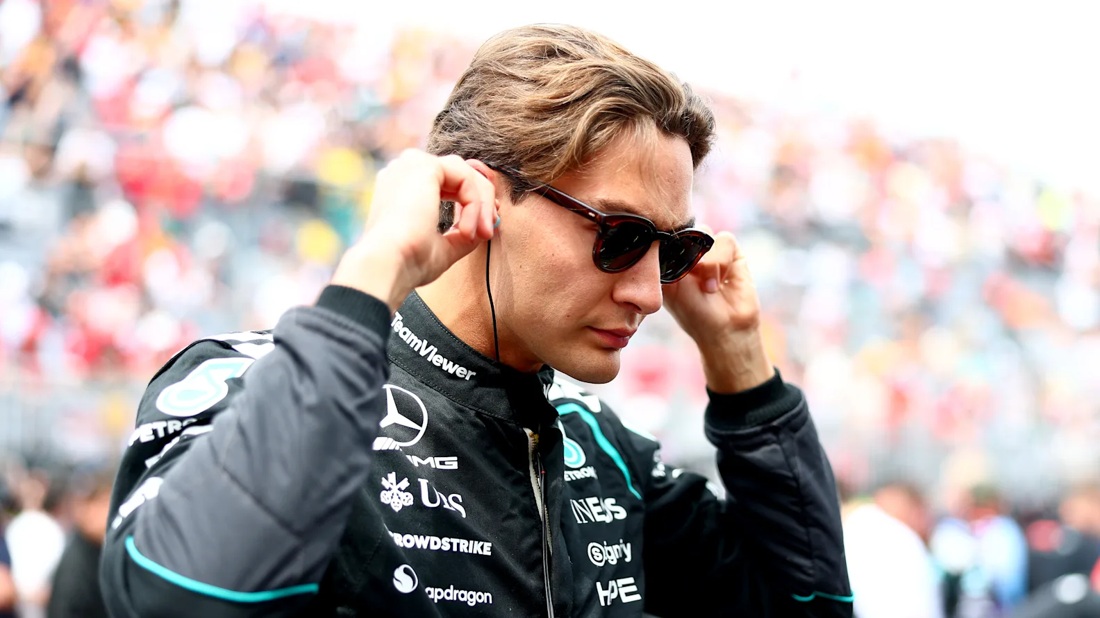MONTREAL, QUEBEC - MAY 23: George Russell of Great Britain and Mercedes AMG Petronas F1 Team on the grid prior to the Sprint ahead of the F1 Grand Prix of Canada at Circuit Gilles-Villeneuve on May 23, 2026 in Montreal, Quebec. (Photo by Bryn Lennon - Formula 1/Formula 1 via Getty Images)