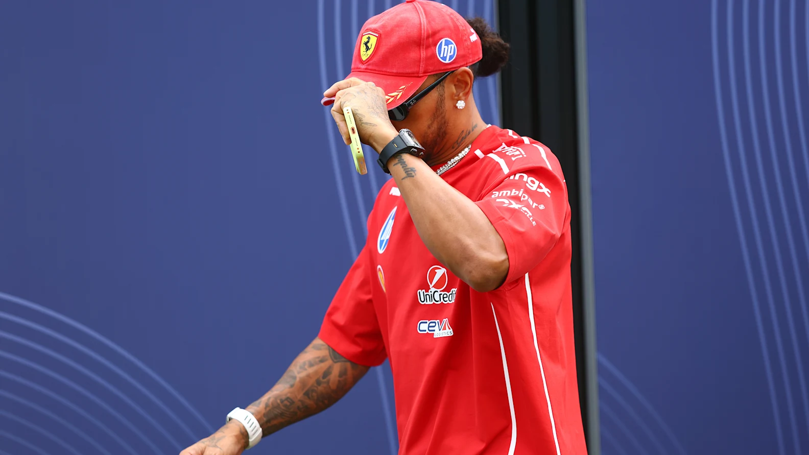 MONZA, ITALY - SEPTEMBER 05: Lewis Hamilton of Great Britain and Scuderia Ferrari arrives in the