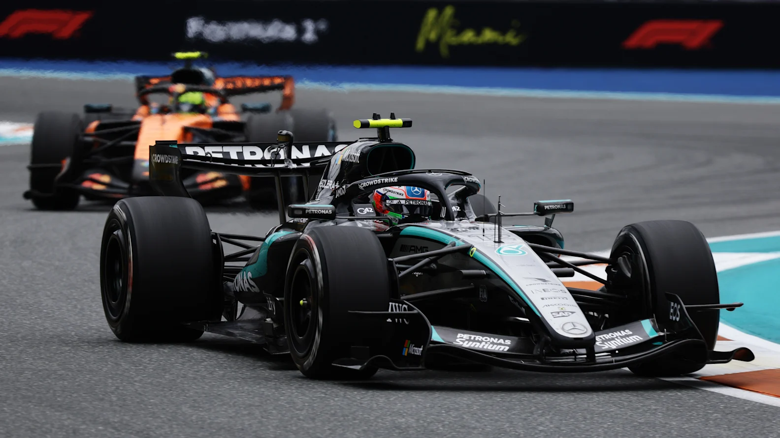 MIAMI, FLORIDA - MAY 03: Andrea Kimi Antonelli of Italy driving the (12) Mercedes AMG Petronas F1 Team W17 leads Lando Norris of Great Britain driving the (1) McLaren MCL40 Mercedes on track during the F1 Grand Prix of Miami at Miami International Autodrome on May 03, 2026 in Miami, Florida. (Photo by Mark Thompson/Getty Images)