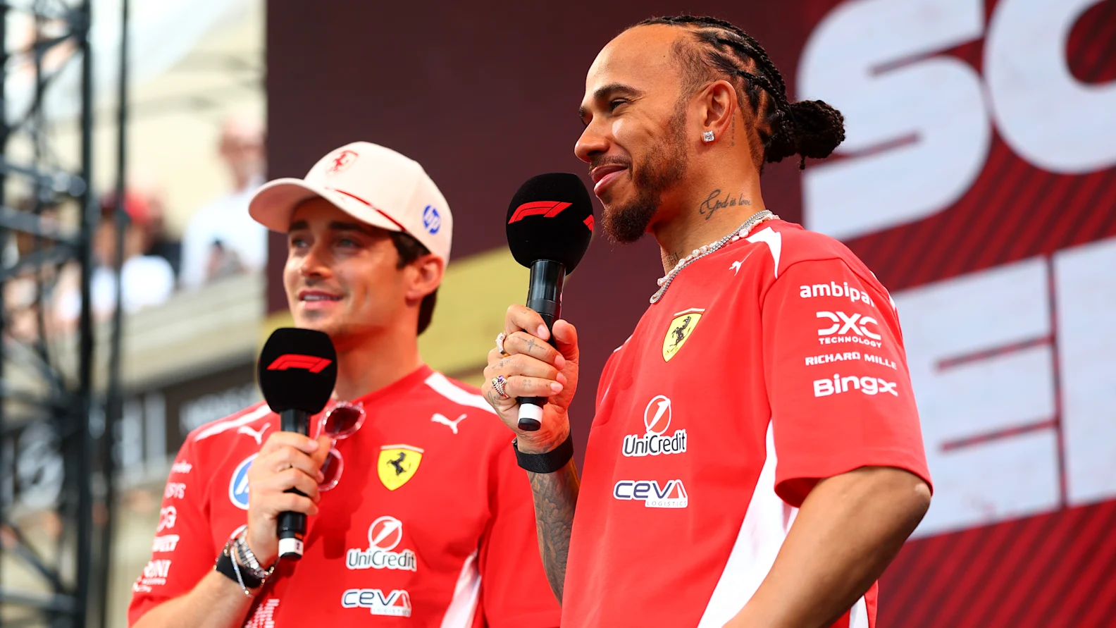 MONTE-CARLO, MONACO - JUNE 05: Charles Leclerc of Monaco and Scuderia Ferrari and Lewis Hamilton of