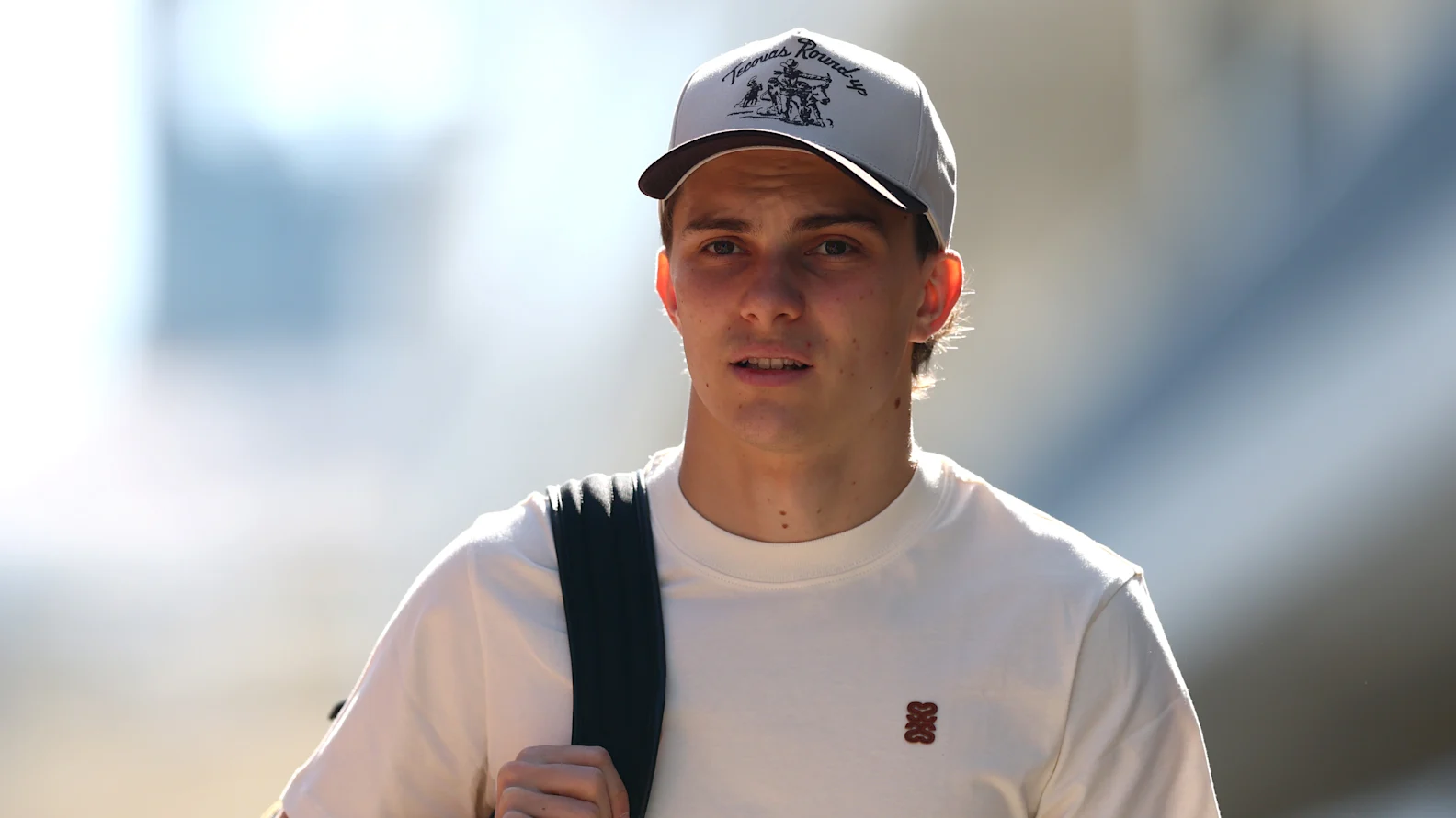 AUSTIN, TEXAS - OCTOBER 22: Oscar Piastri of Australia and McLaren arrives in the Paddock during