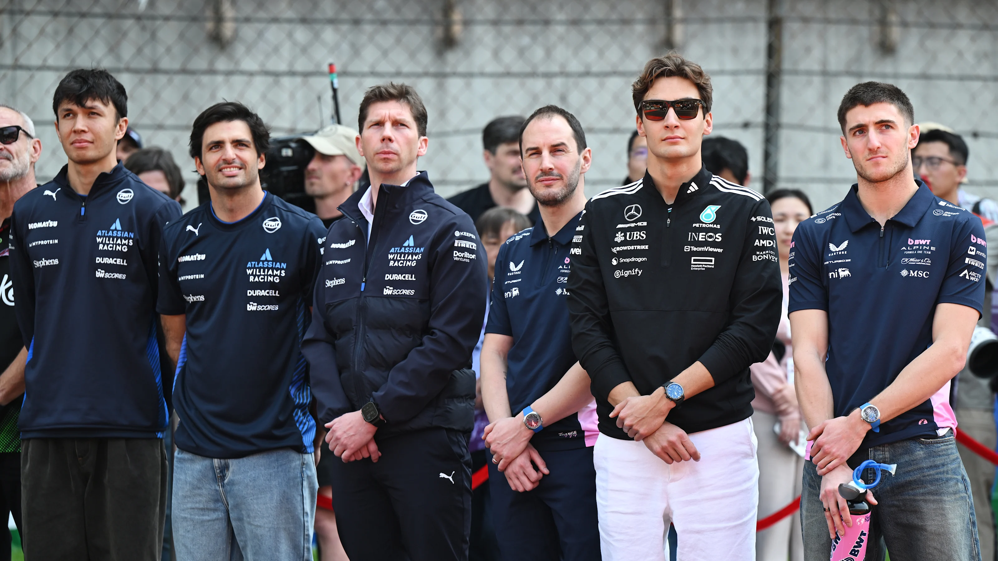 SHANGHAI, CHINA - MARCH 23: Drivers and team personnel gather for a tribute to the late Eddie