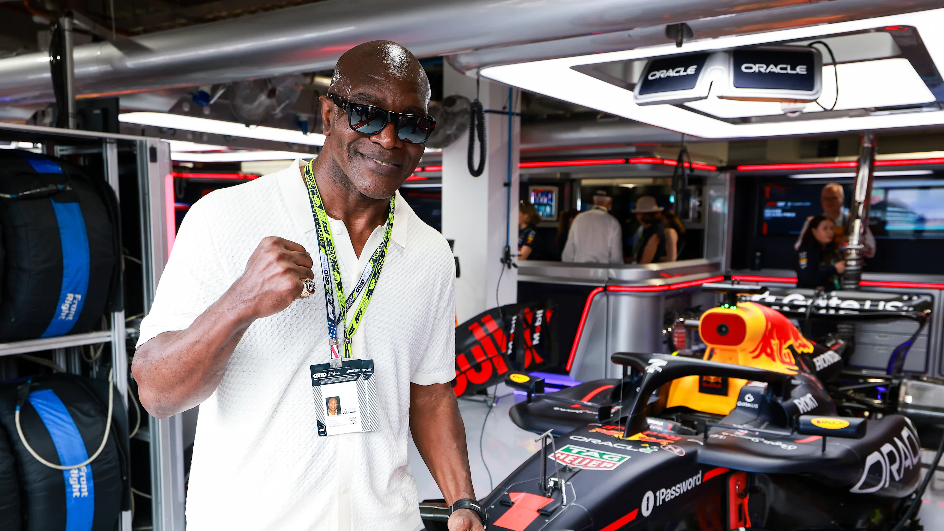 MIAMI, FLORIDA - MAY 04: Former boxer Evander Holyfield in the Oracle Red Bull Racing garage prior