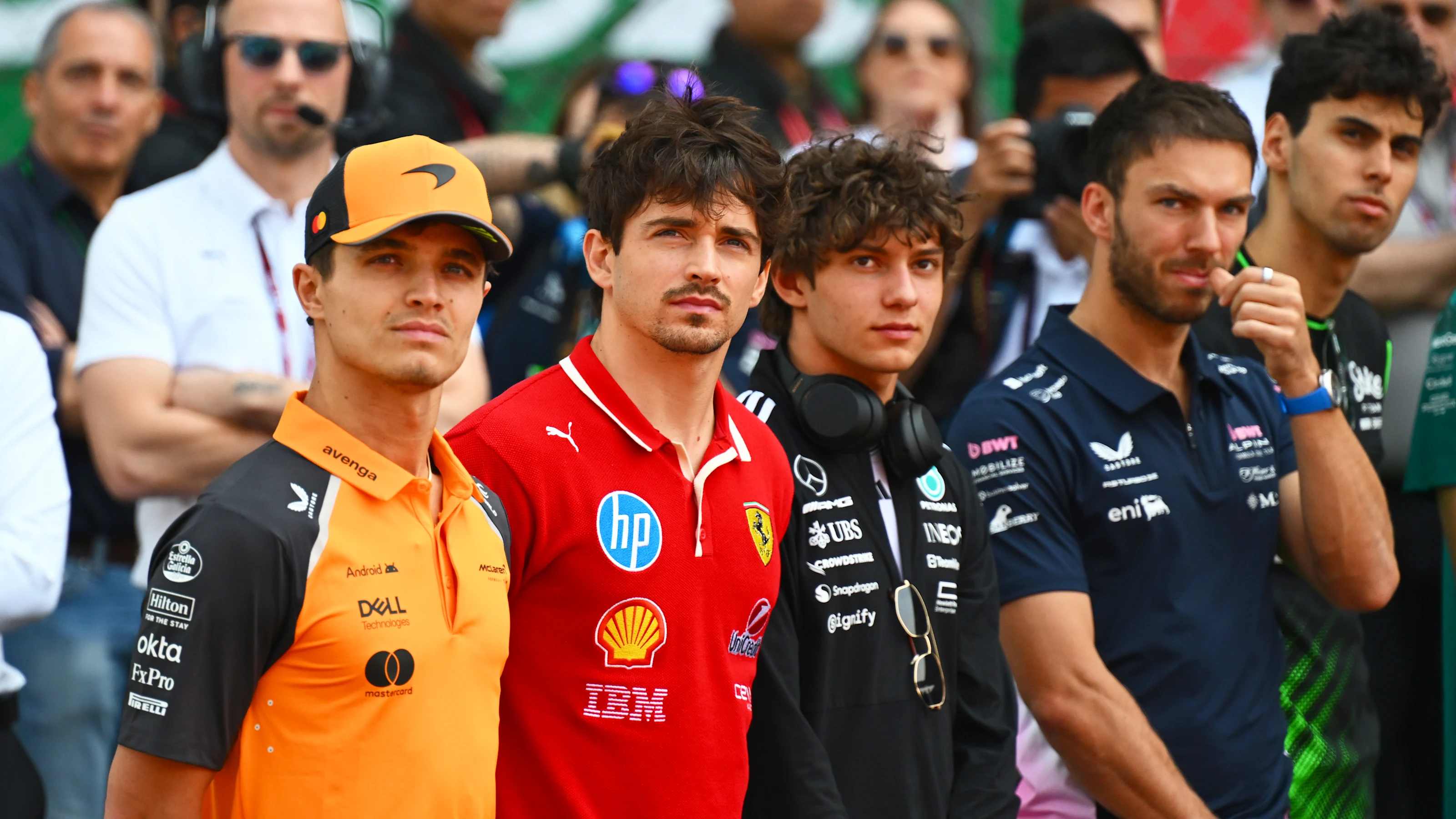 SHANGHAI, CHINA - MARCH 23: Lando Norris of Great Britain and McLaren, Charles Leclerc of Monaco