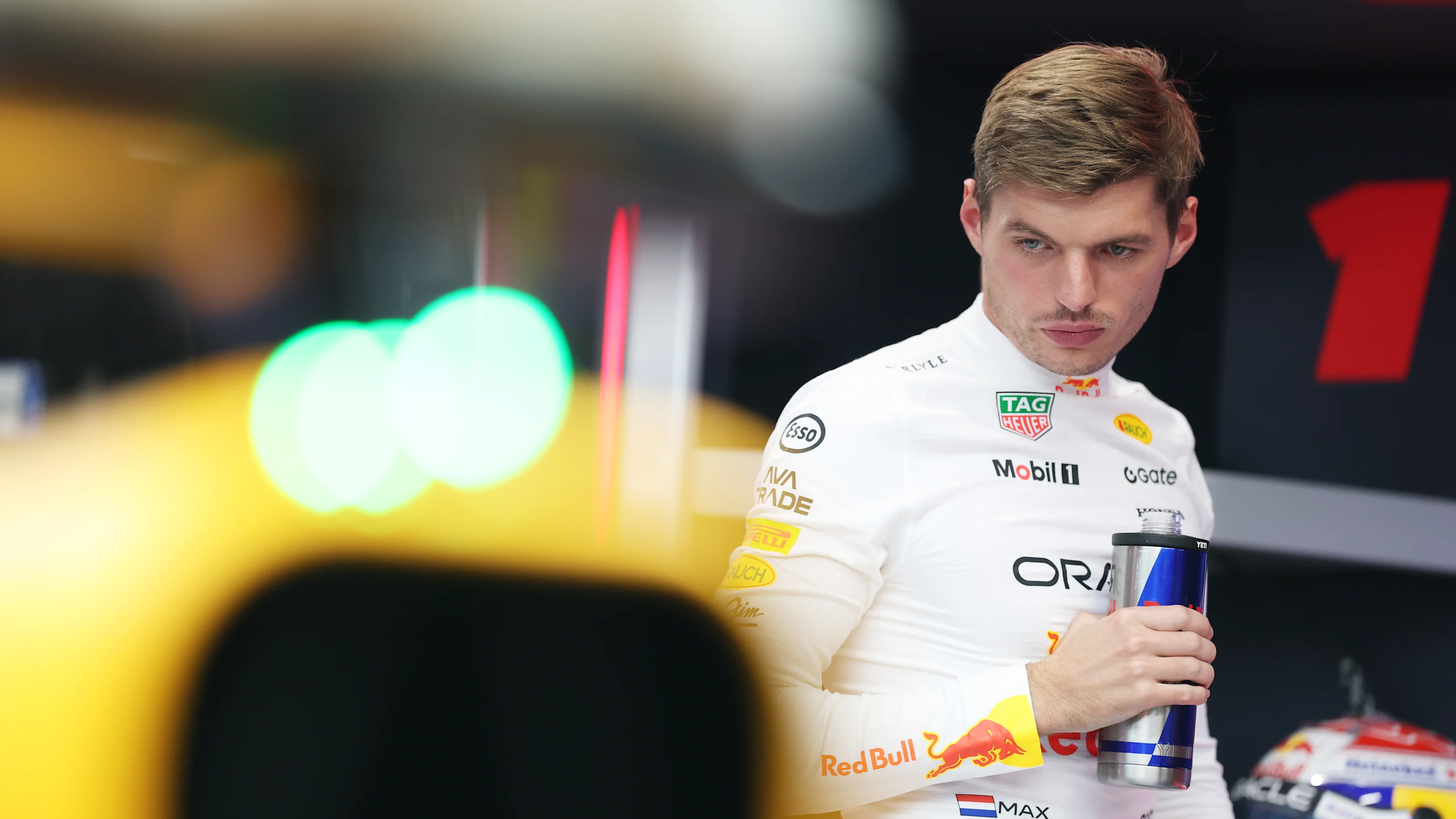 SINGAPORE, SINGAPORE - OCTOBER 04: Max Verstappen of the Netherlands driving the (1) Oracle Red