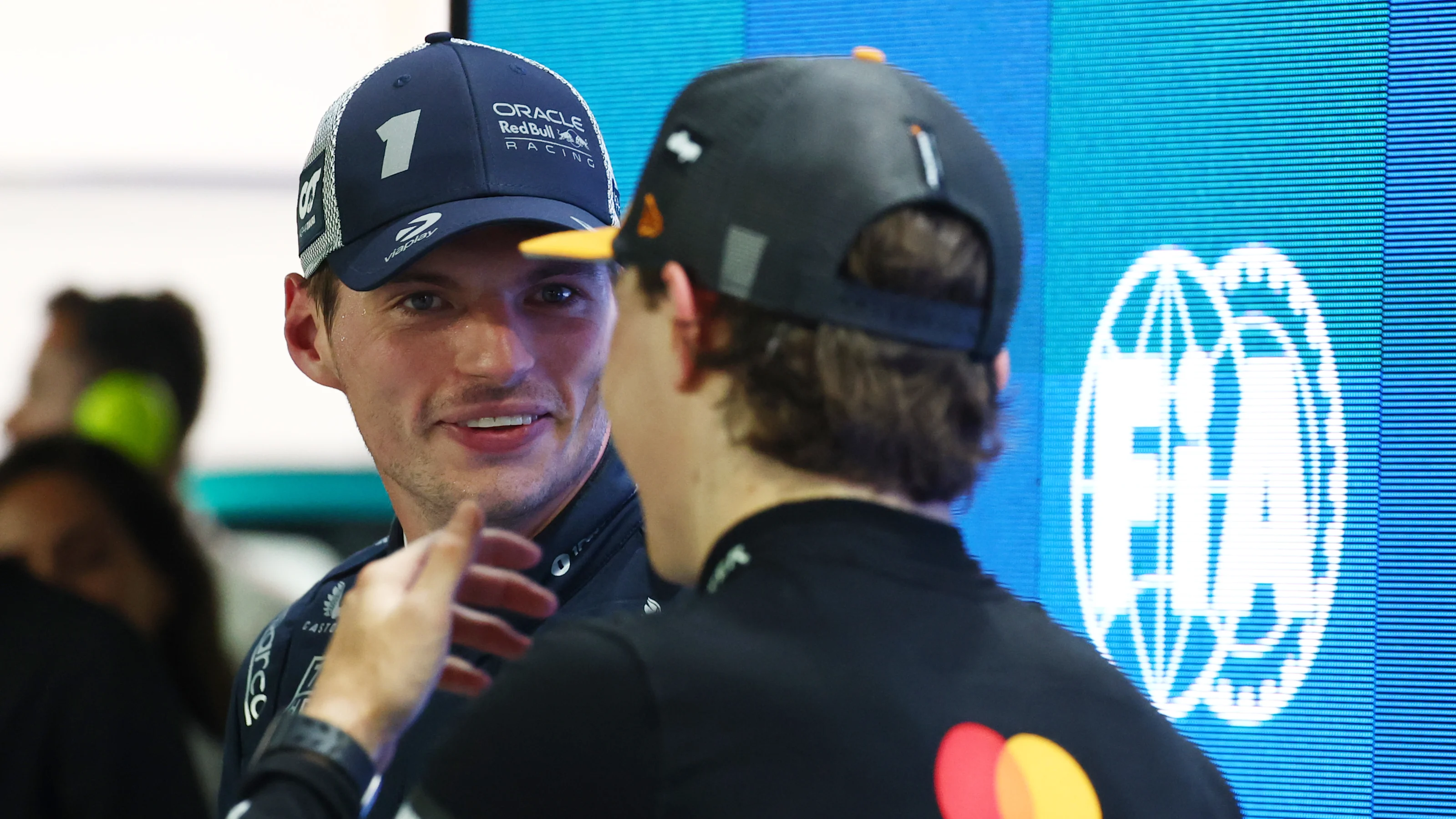 SINGAPORE, SINGAPORE - OCTOBER 04: Second placed qualifier Max Verstappen of the Netherlands and