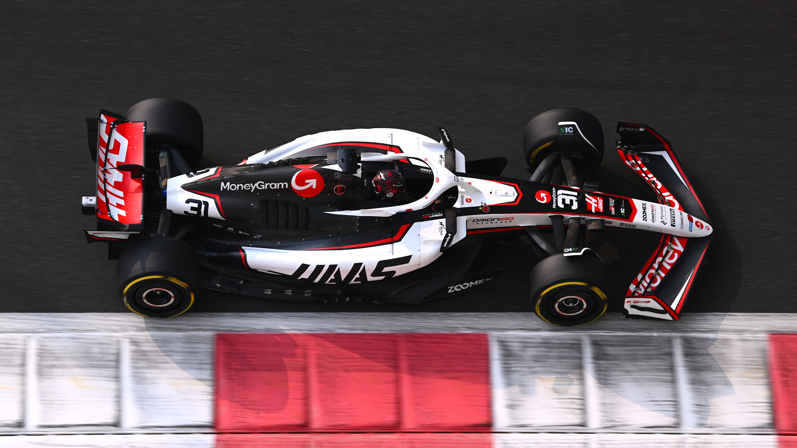 ABU DHABI, UNITED ARAB EMIRATES - DECEMBER 06: Esteban Ocon of France driving the (31) Haas F1