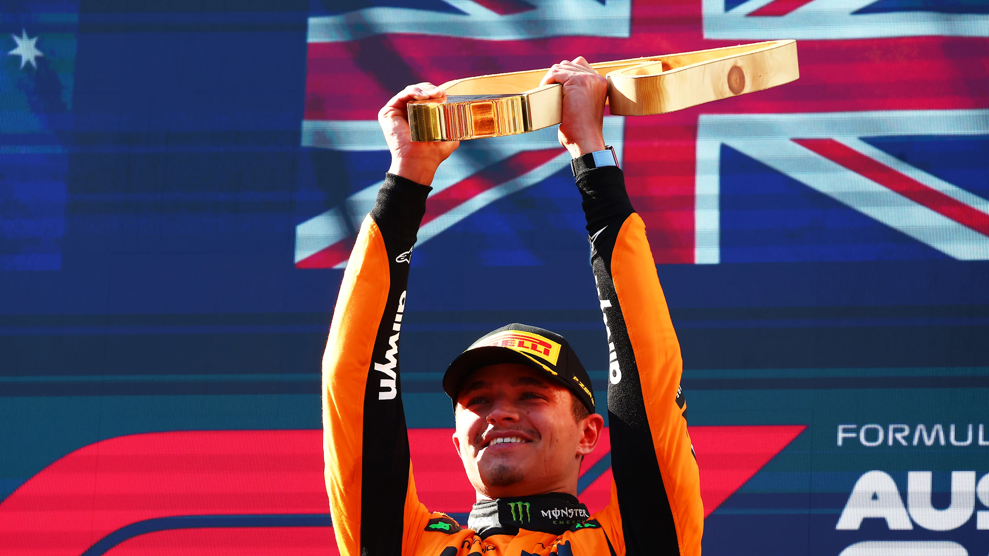SPIELBERG, AUSTRIA - JUNE 29: Race winner Lando Norris of Great Britain and McLaren lifts his