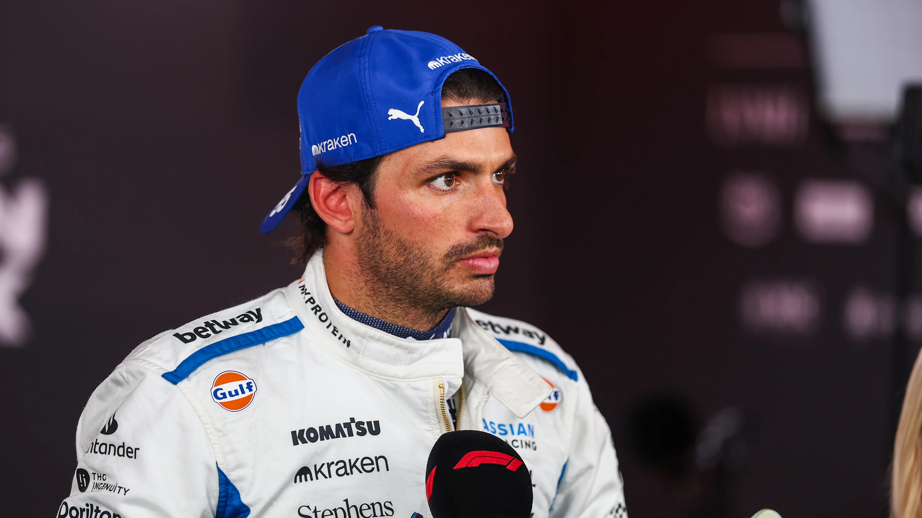 BAKU, AZERBAIJAN - SEPTEMBER 19: Carlos Sainz of Spain and Williams talks to the media during