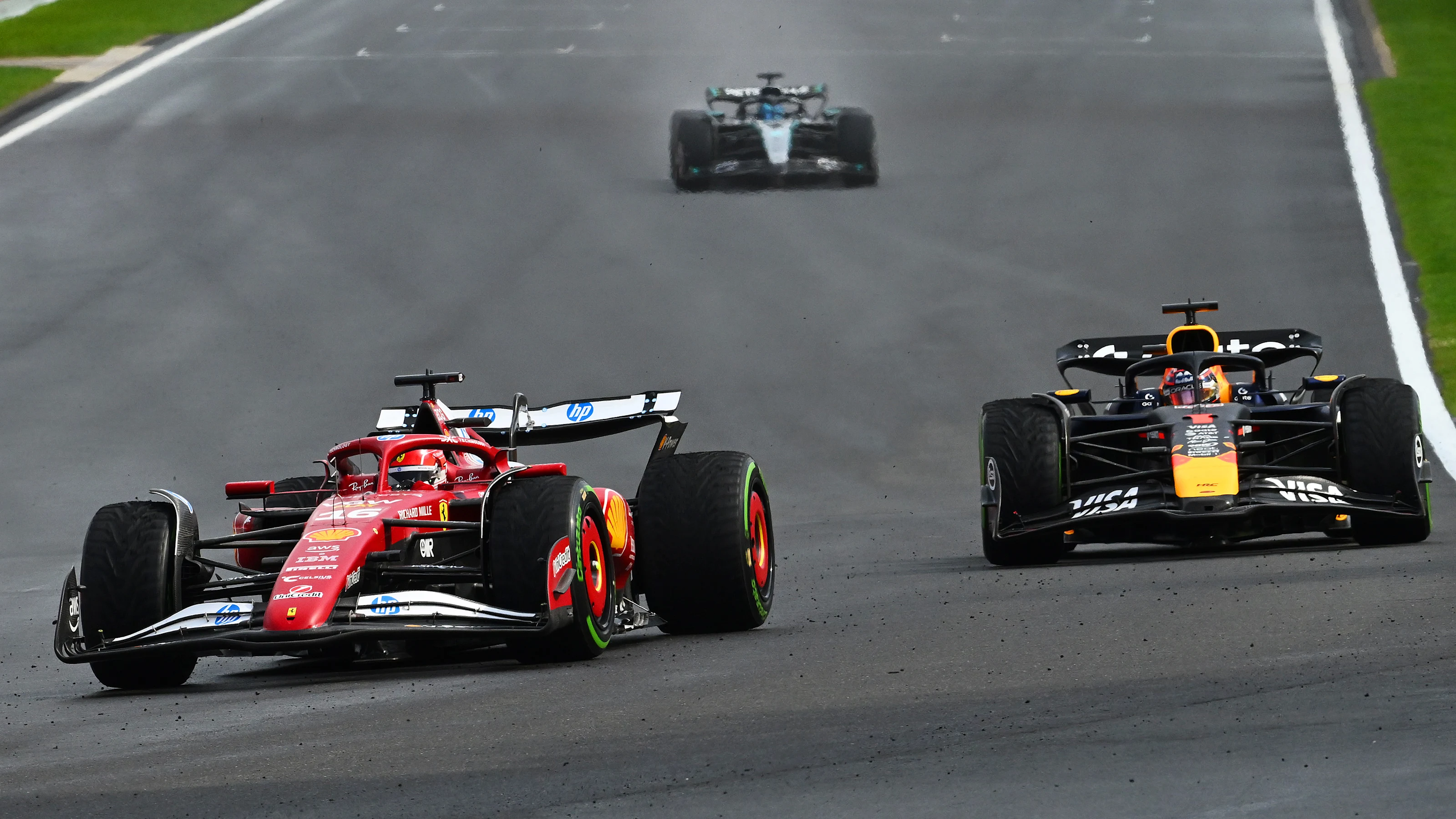 SPA, BELGIUM - JULY 27: Charles Leclerc of Monaco driving the (16) Scuderia Ferrari SF-25 leads Max