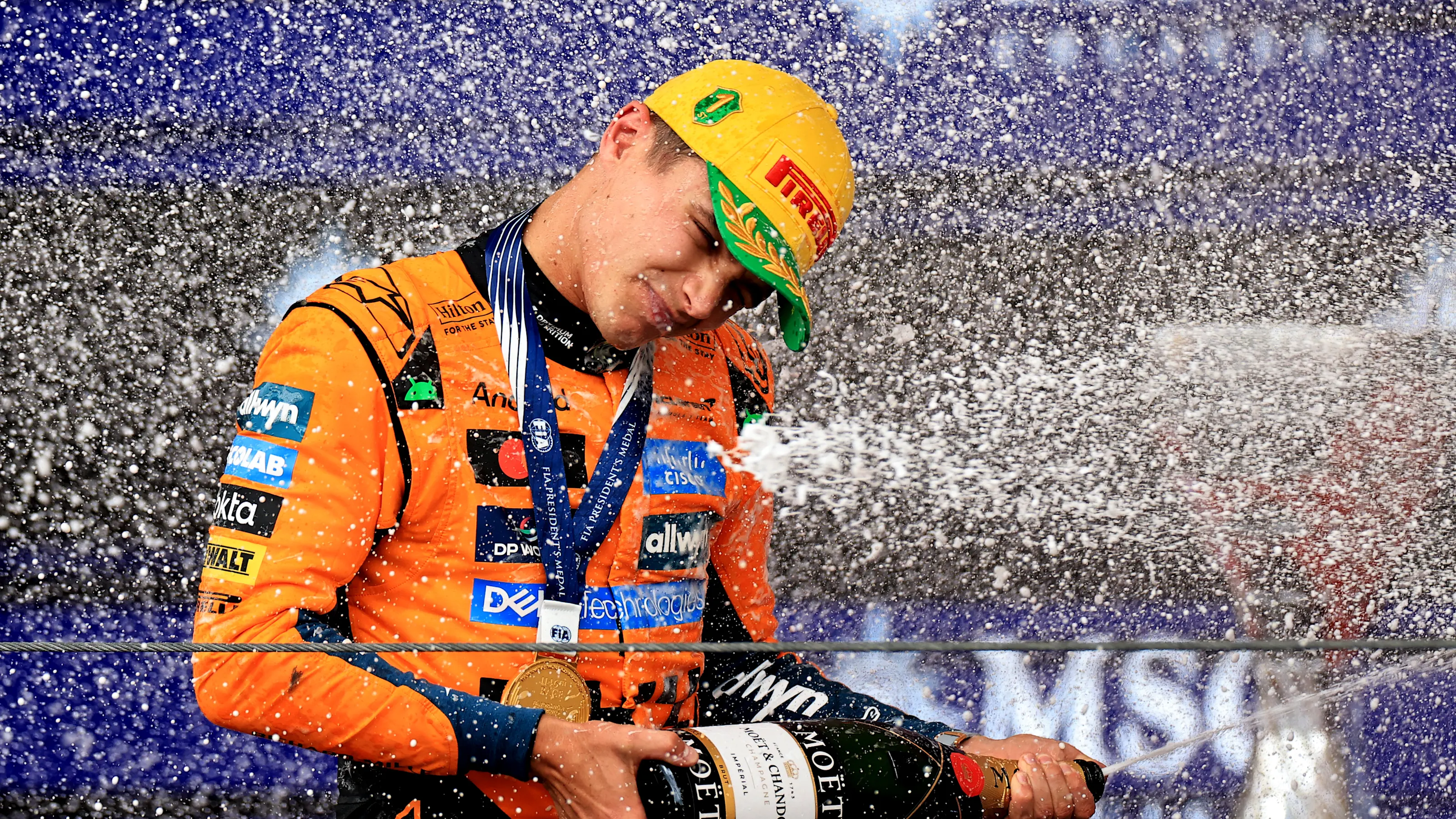 SAO PAULO, BRAZIL - NOVEMBER 09: Race winner Lando Norris of Great Britain and McLaren sprays the