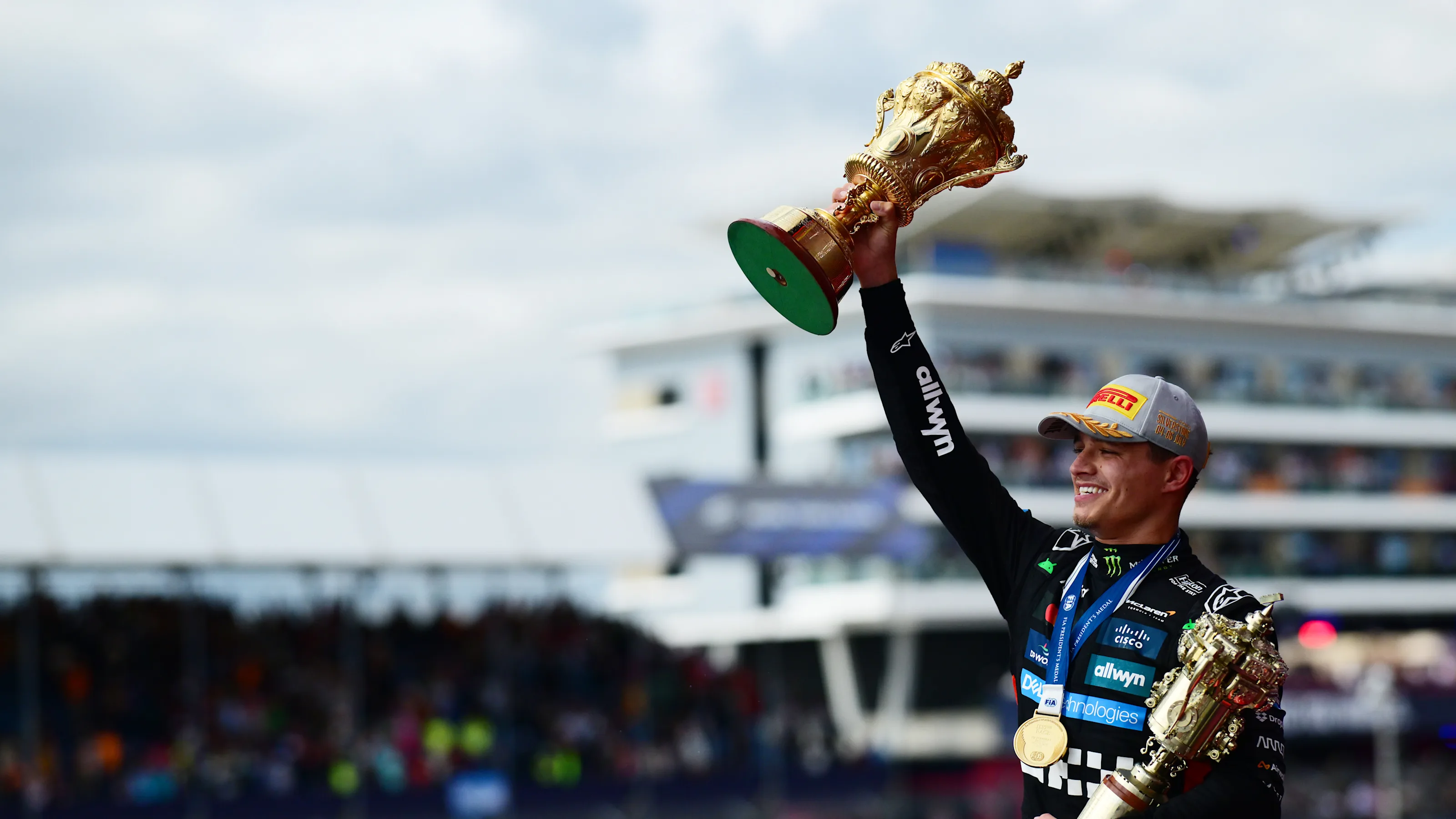 NORTHAMPTON, ENGLAND - JULY 06: Race winner Lando Norris of Great Britain and McLaren on the podium