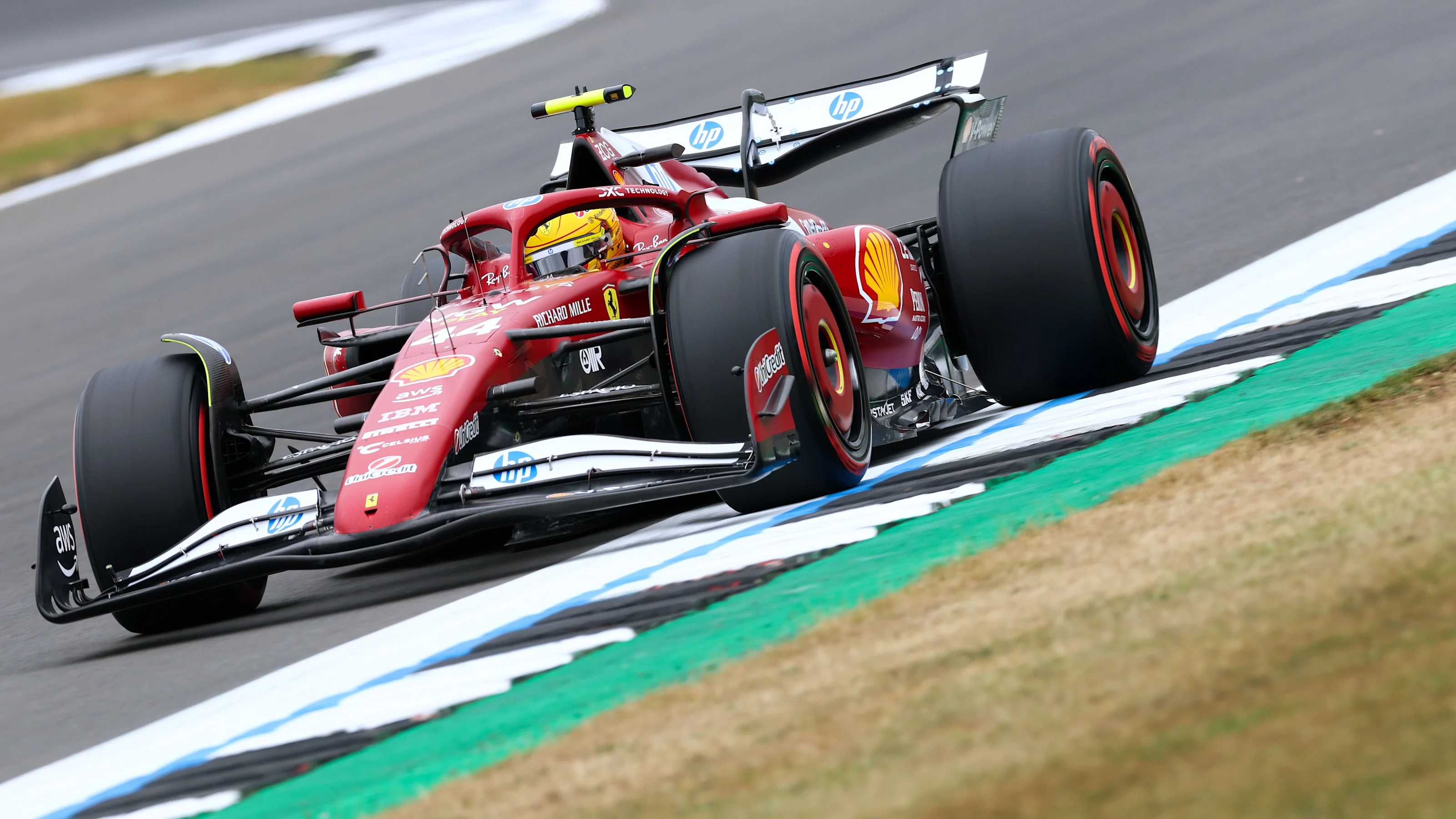 NORTHAMPTON, ENGLAND - JULY 05: Lewis Hamilton of Great Britain driving the (44) Scuderia Ferrari