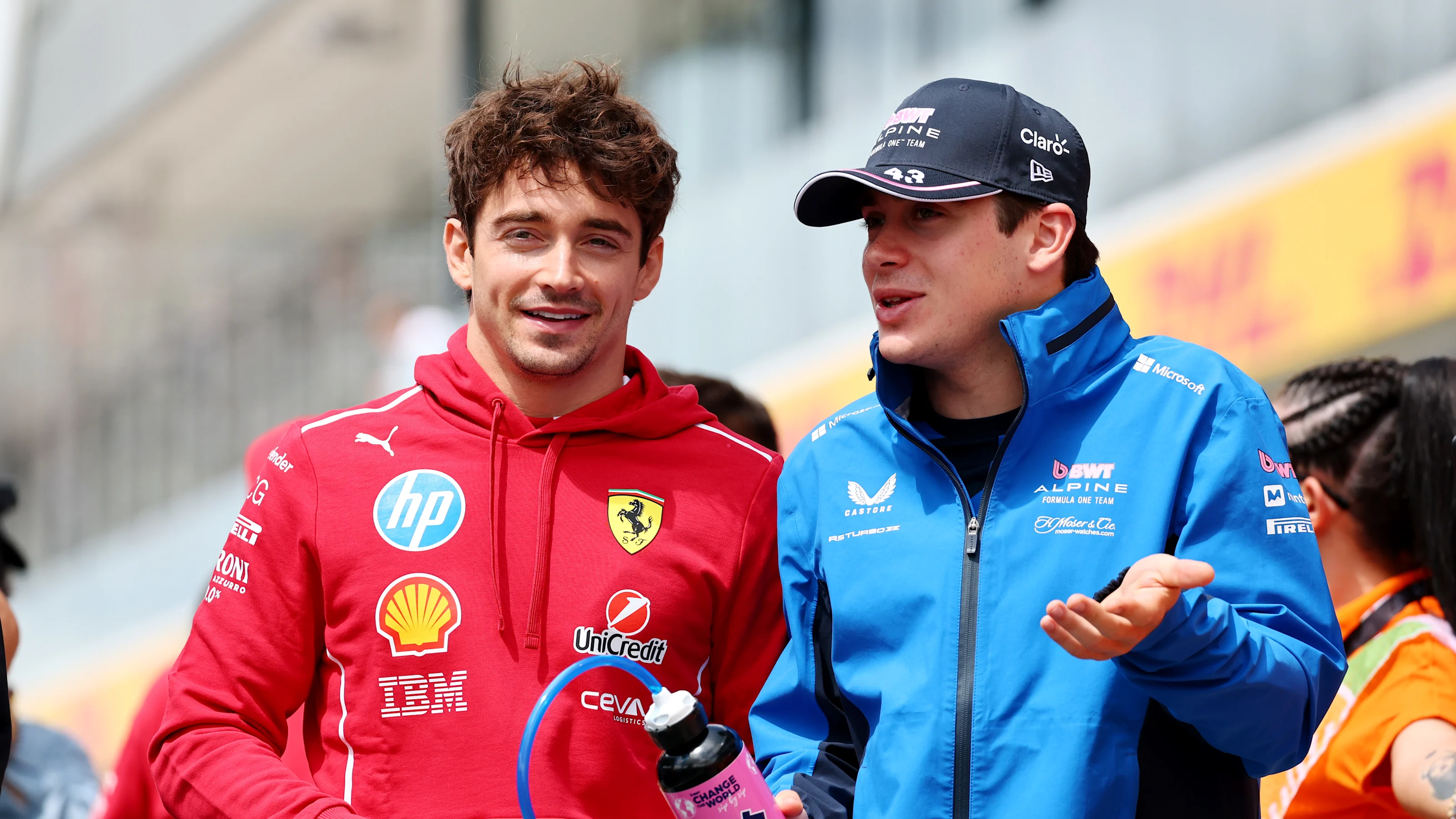 BUDAPEST, HUNGARY - AUGUST 03: Charles Leclerc of Monaco and Scuderia Ferrari and Franco Colapinto