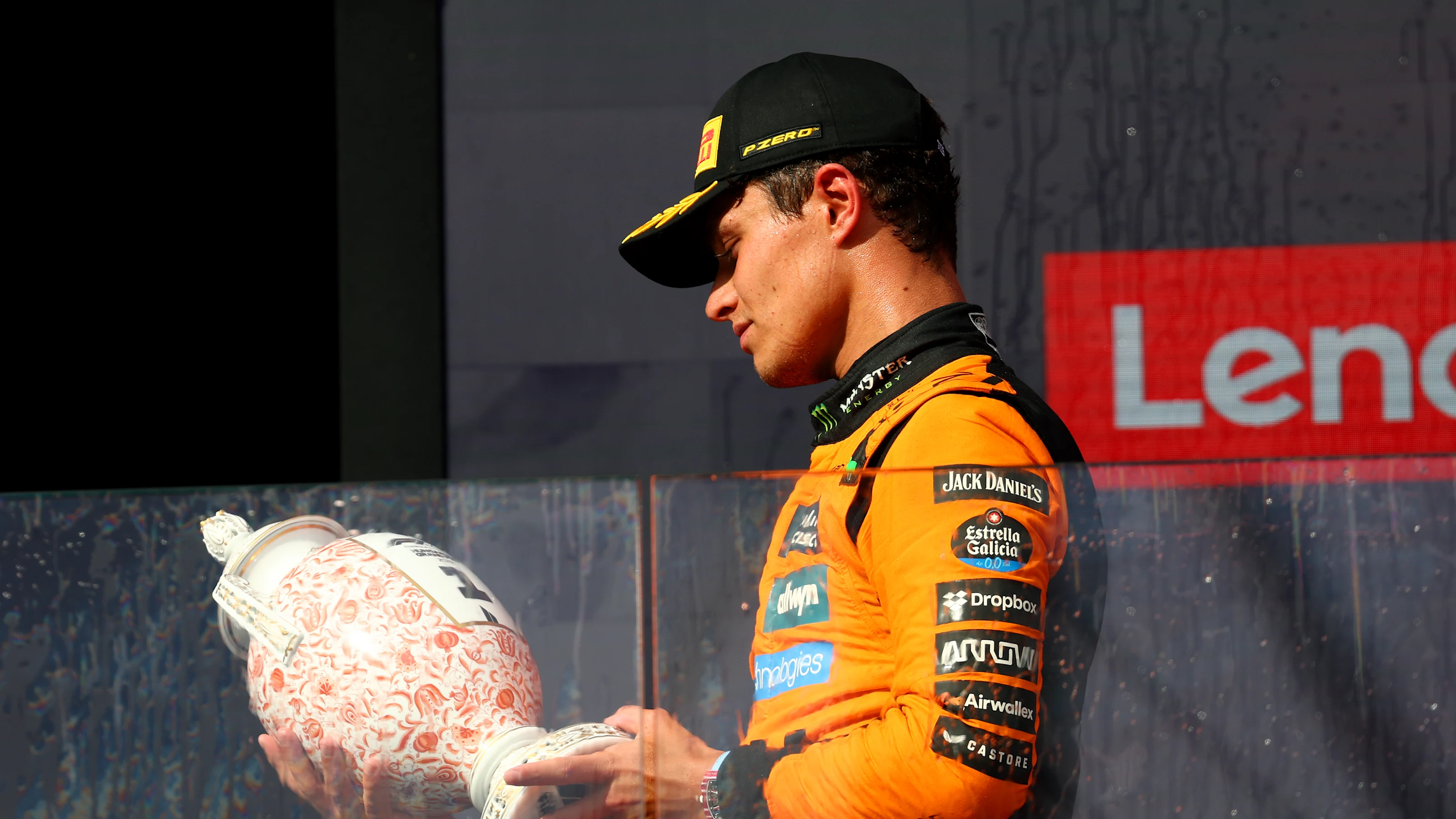 BUDAPEST, HUNGARY - AUGUST 03: Race winner Lando Norris of Great Britain and McLaren inspects his