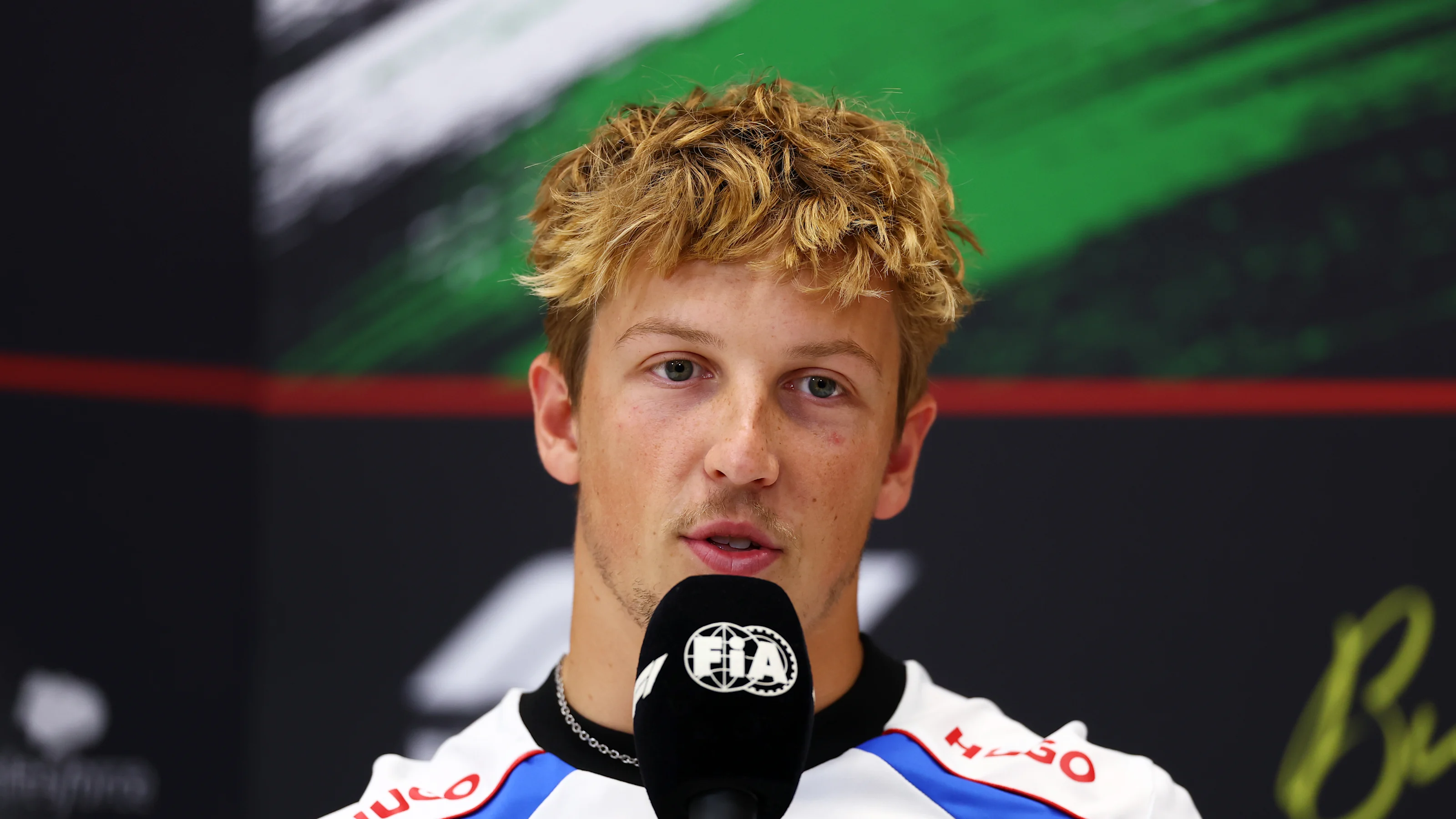 BUDAPEST, HUNGARY - JULY 31: Liam Lawson of New Zealand and Visa Cash App Racing Bulls speaks in