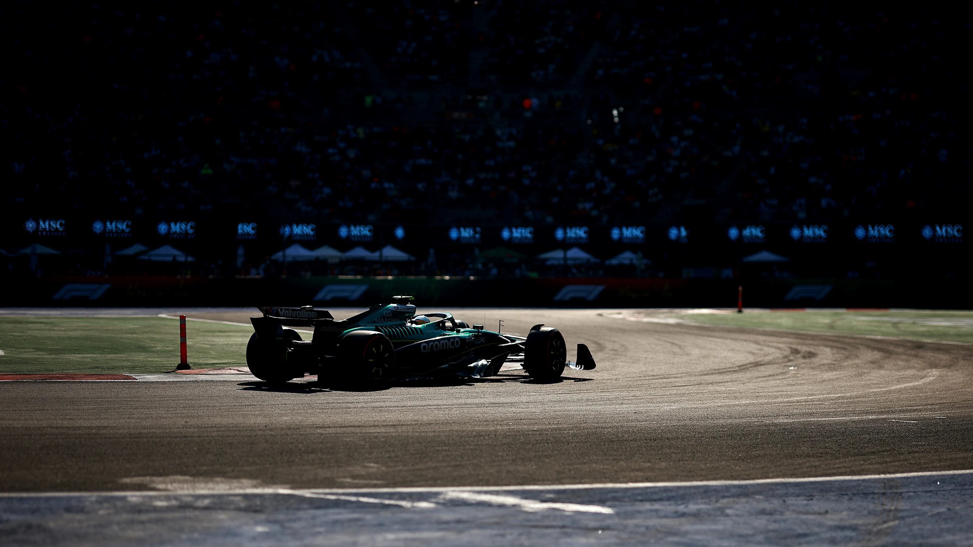 MEXICO CITY, MEXICO - OCTOBER 25: Fernando Alonso of Spain driving the (14) Aston Martin F1 Team