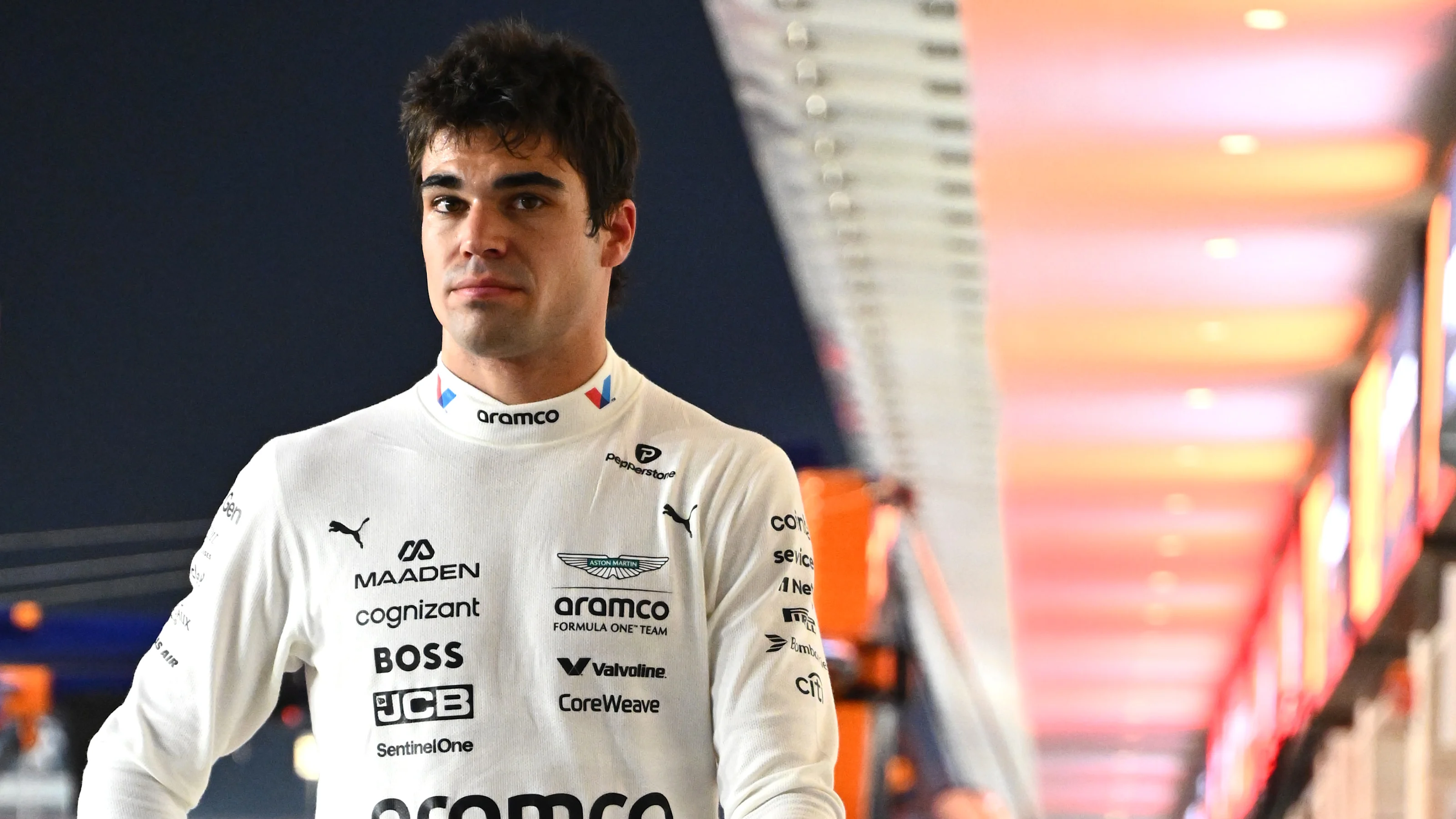 LUSAIL CITY, QATAR - NOVEMBER 28: Lance Stroll of Canada and Aston Martin F1 Team looks on in the