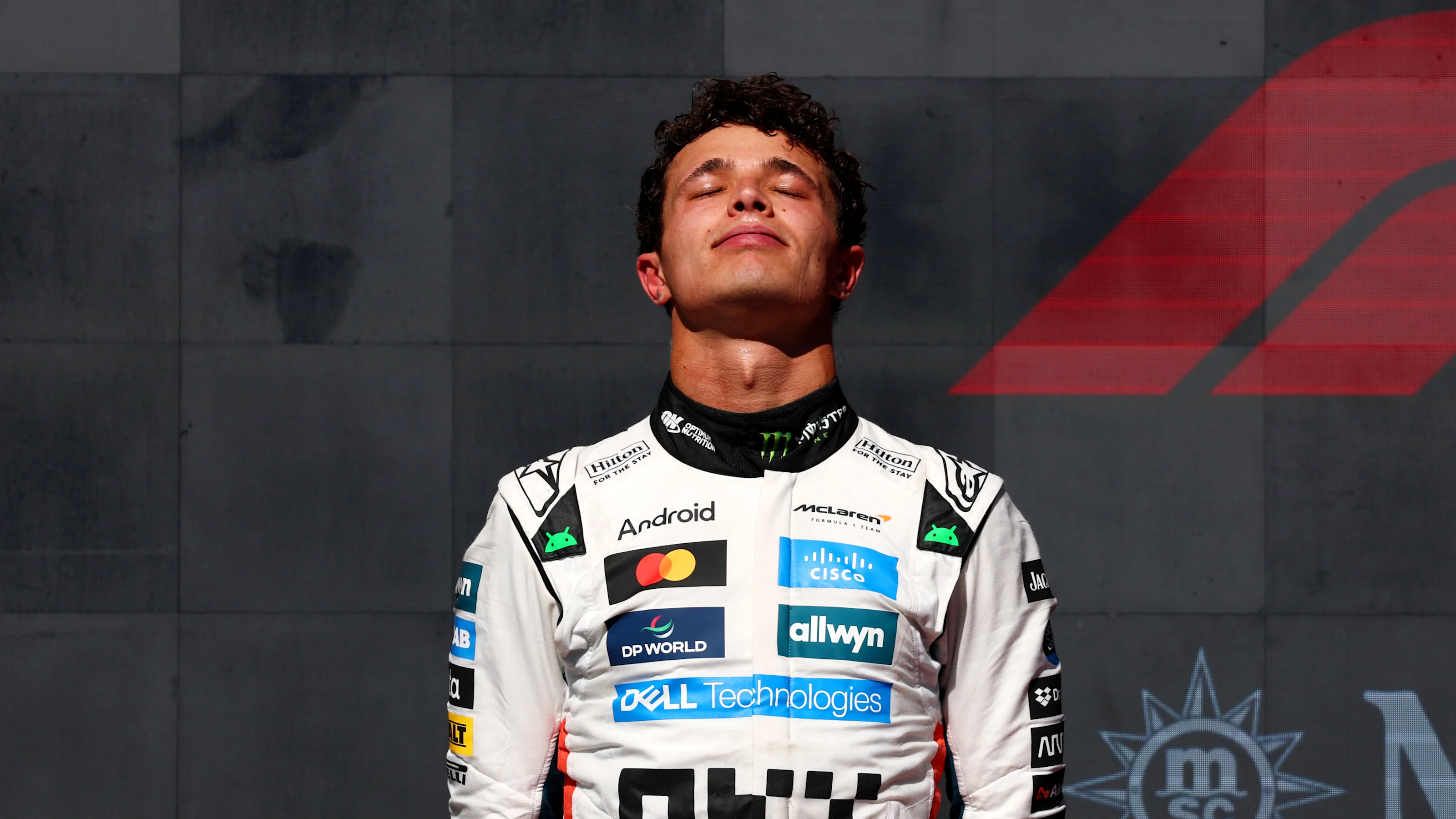 AUSTIN, TEXAS - OCTOBER 19: Second placed Lando Norris of Great Britain and McLaren on the podium