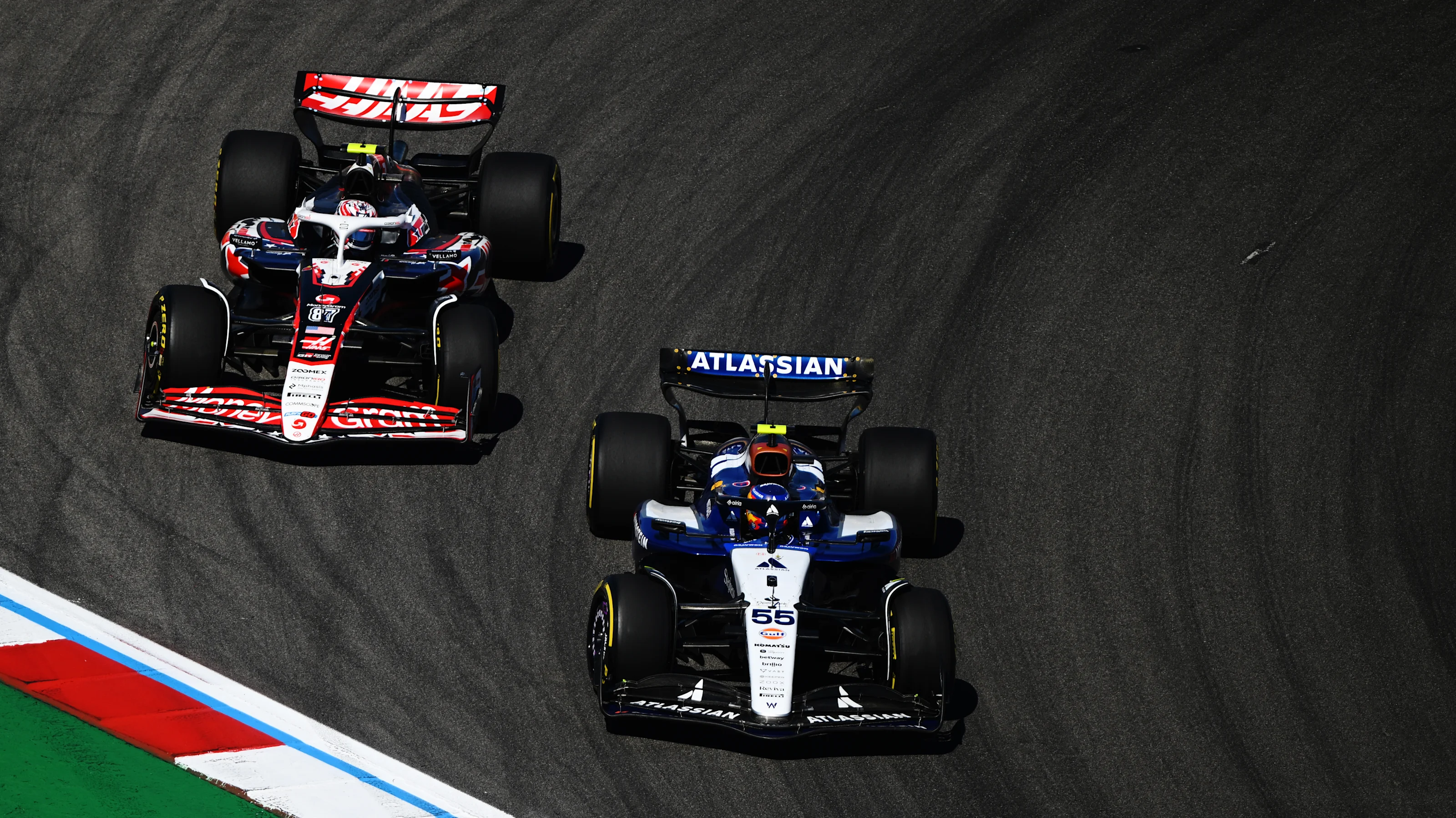 AUSTIN, TEXAS - OCTOBER 19: Carlos Sainz of Spain driving the (55) Williams FW47 Mercedes leads