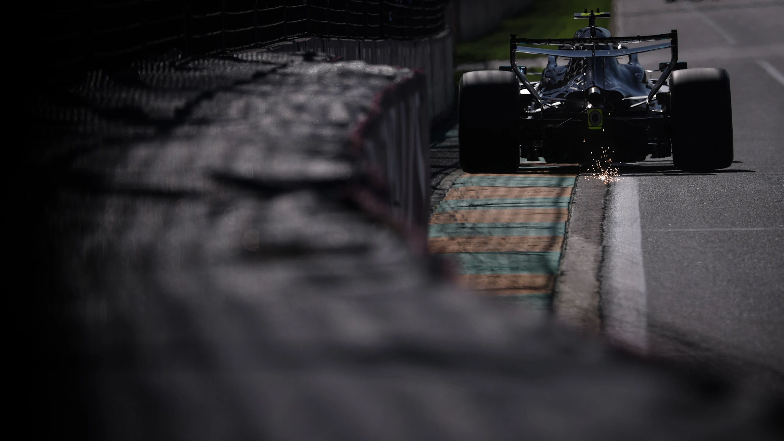 MELBOURNE, AUSTRALIA - MARCH 06: Sparks fly behind Andrea Kimi Antonelli of Italy driving the (12)