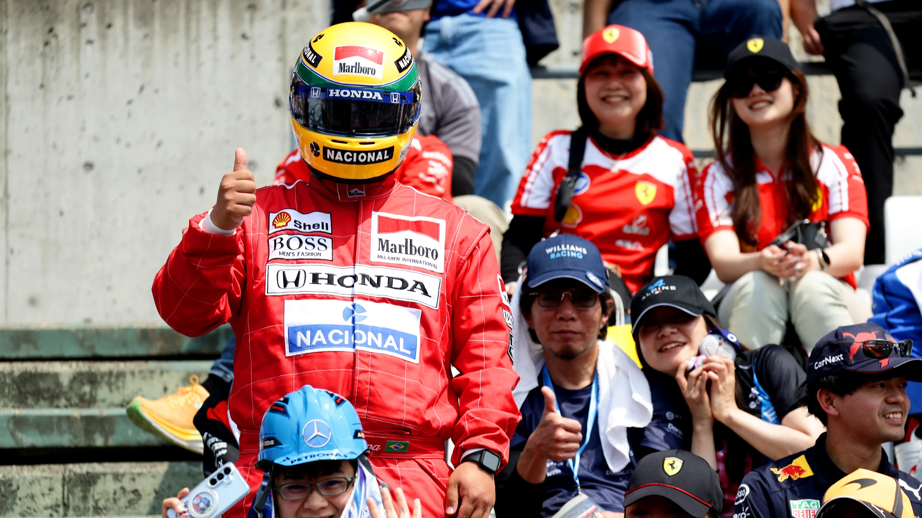 SUZUKA, JAPAN - MARCH 29: A fan dressed as Ayrton Senna at the drivers parade prior to the F1 Grand