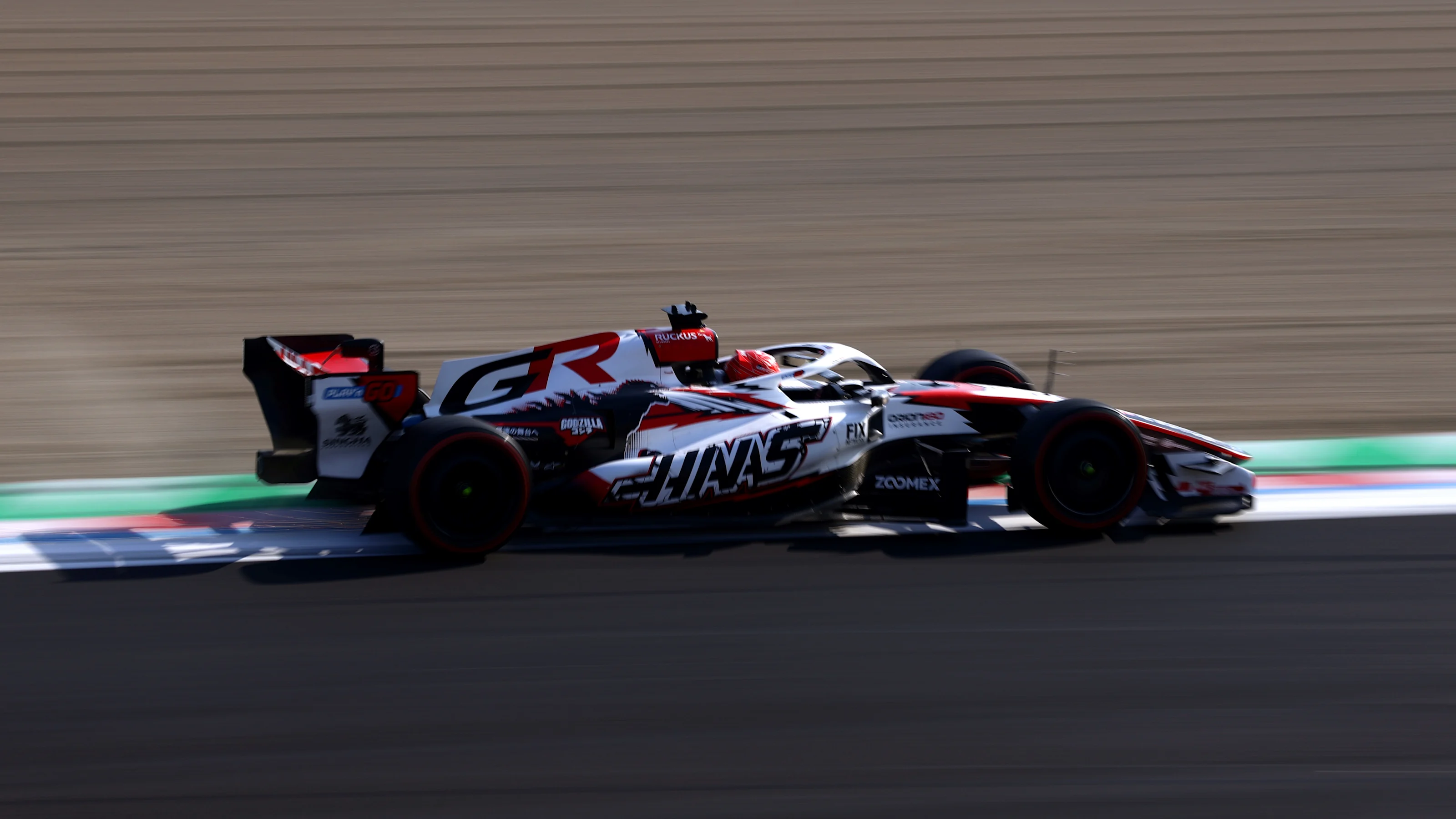 SUZUKA, JAPAN - MARCH 27: Esteban Ocon of France driving the (31) Haas F1 VF-26 Ferrari on track