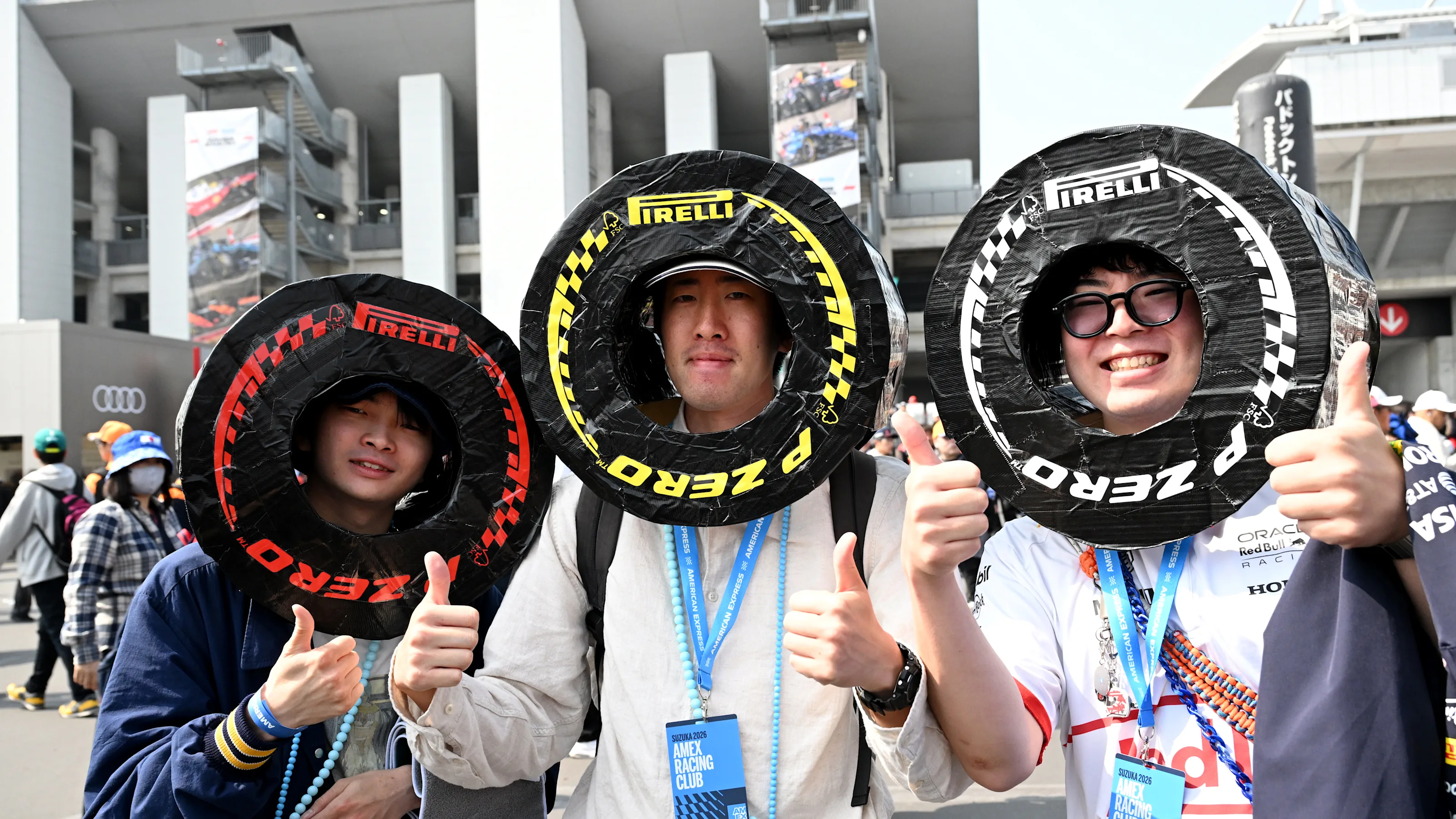 SUZUKA, JAPAN - MARCH 28: Fans dressed as Pirelli tyres in the fan zone prior to final practice