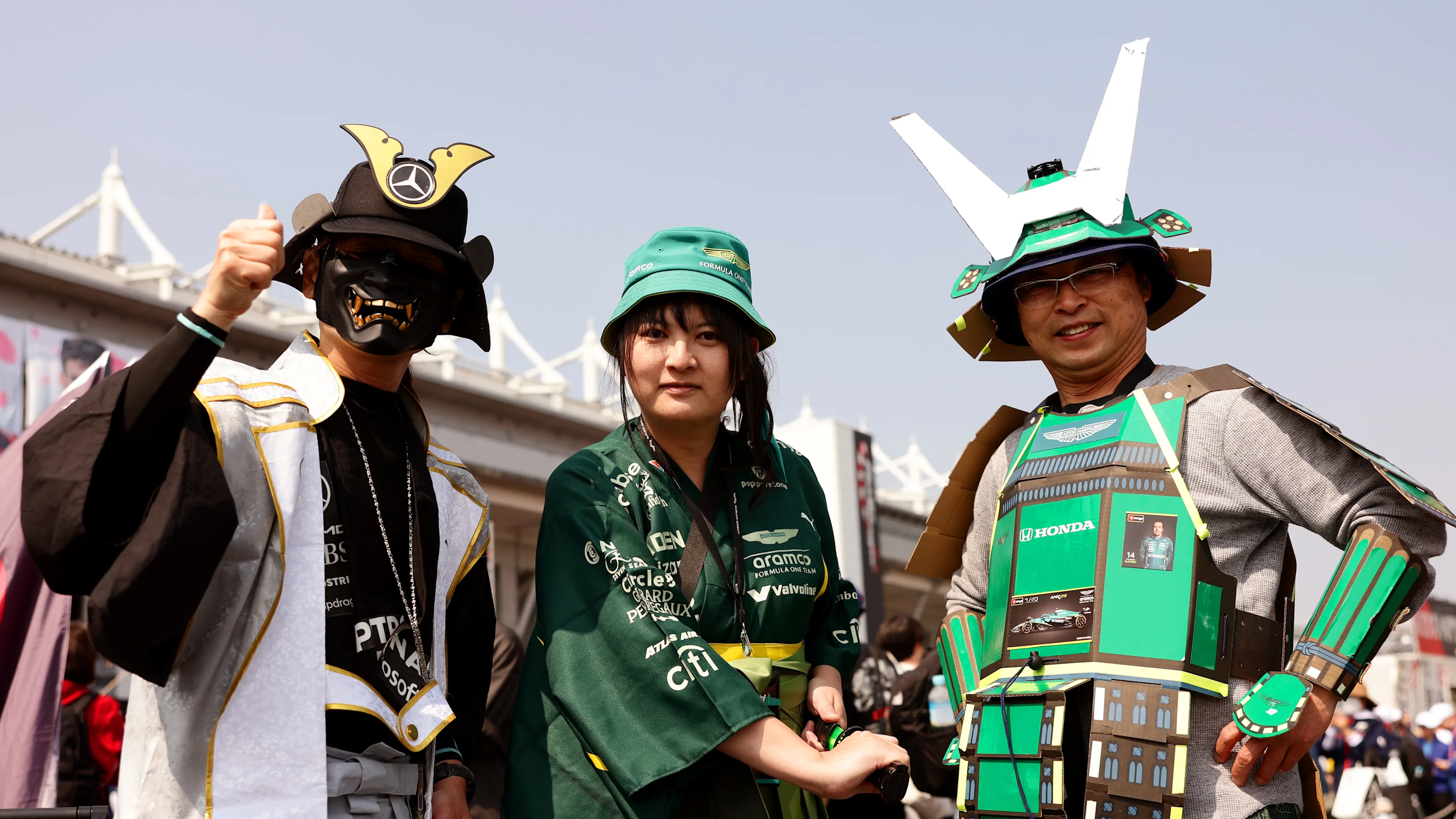SUZUKA, JAPAN - MARCH 28: Fans of Mercedes AMG Petronas F1 Team and Aston Martin F1 Team prior to