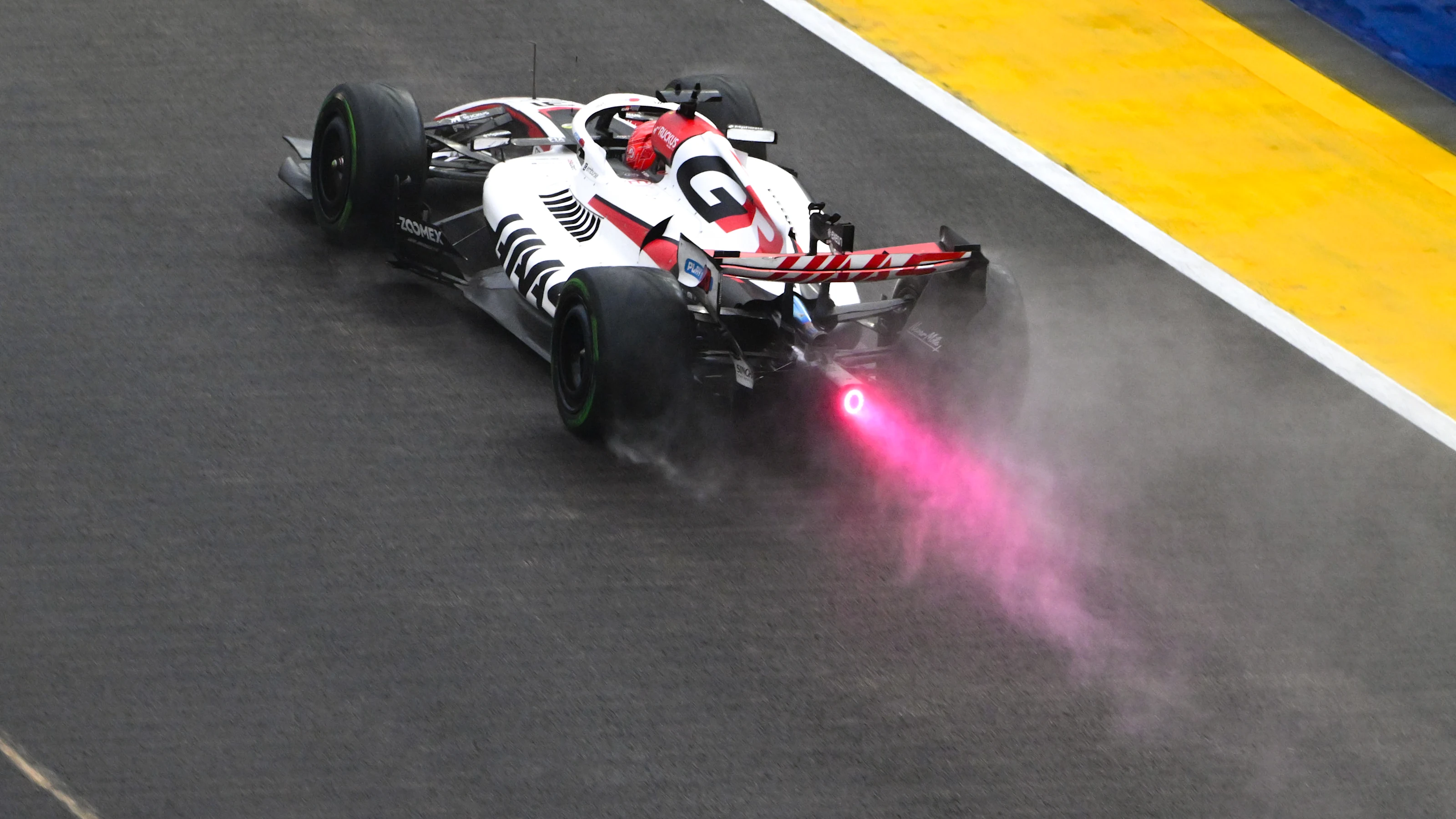 SINGAPORE, SINGAPORE - OCTOBER 10: Esteban Ocon of France driving the (31) Haas F1 VF-26 Ferrari on