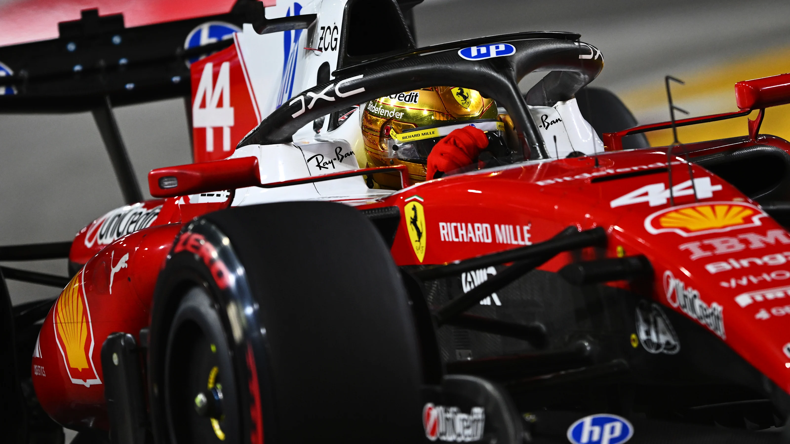 SINGAPORE, SINGAPORE - OCTOBER 10: Lewis Hamilton of Great Britain driving the (44) Scuderia