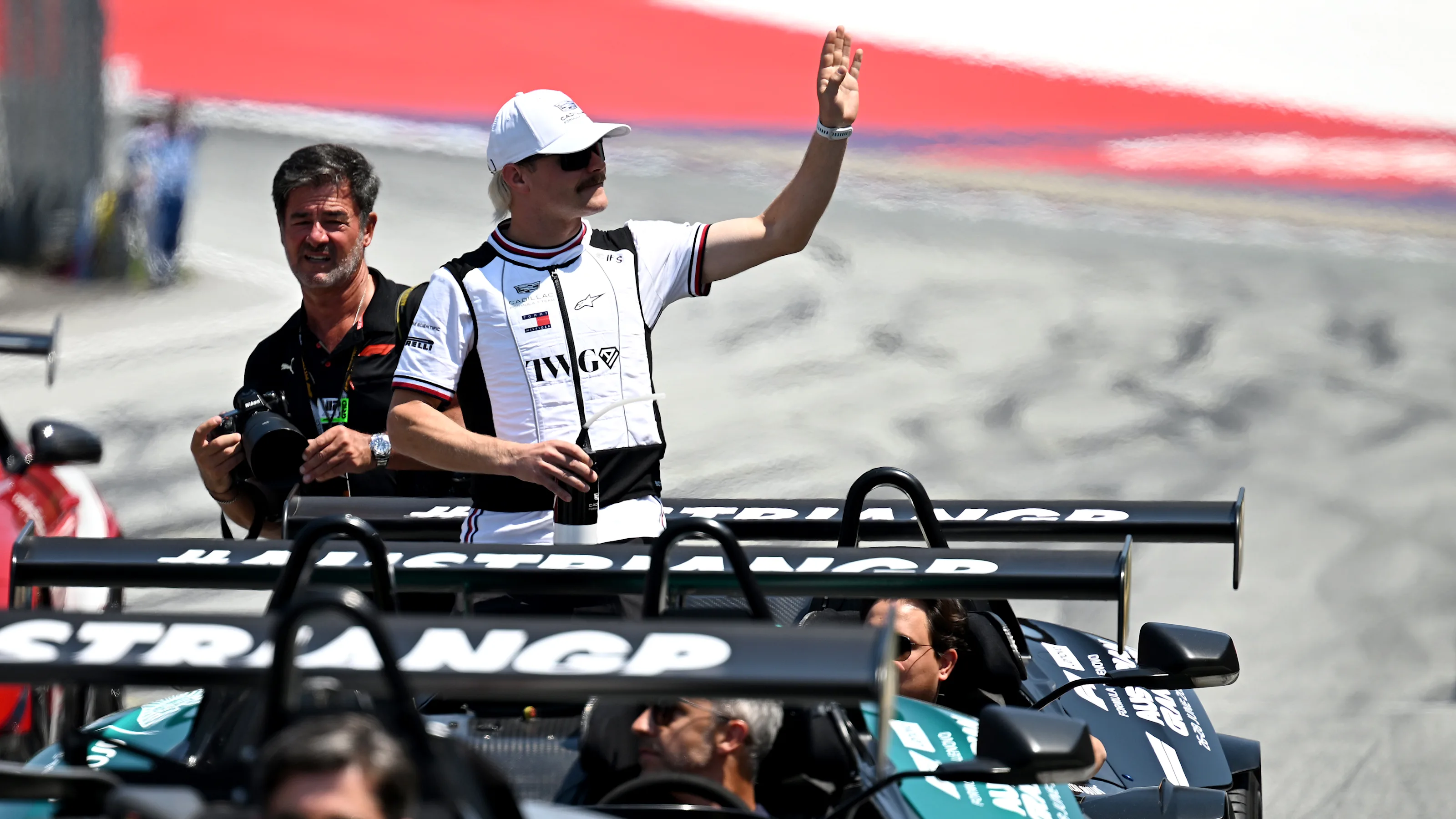 SPIELBERG, AUSTRIA - JUNE 28: Valtteri Bottas of Finland and Cadillac F1 Team on the drivers parade