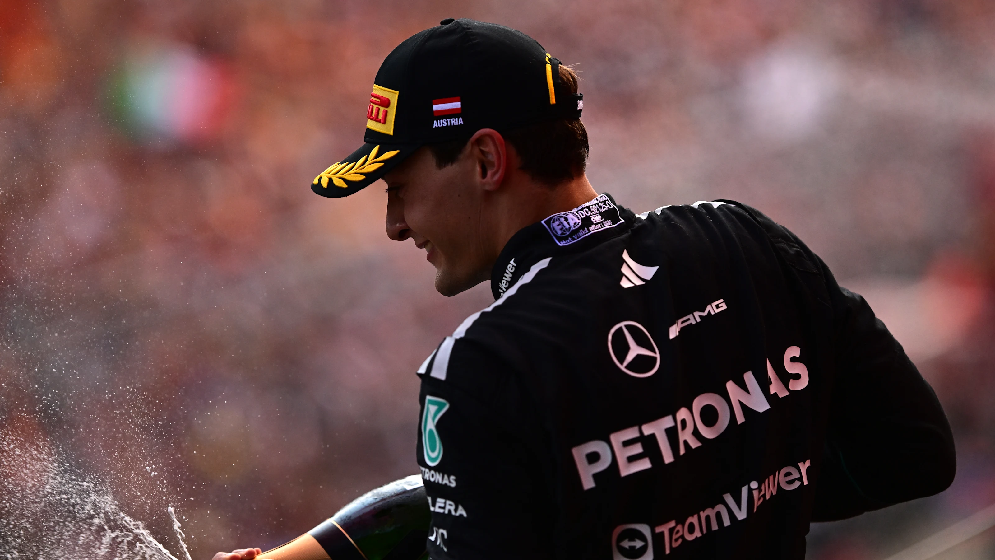SPIELBERG, AUSTRIA - JUNE 28: Race winner George Russell of Great Britain and Mercedes AMG Petronas