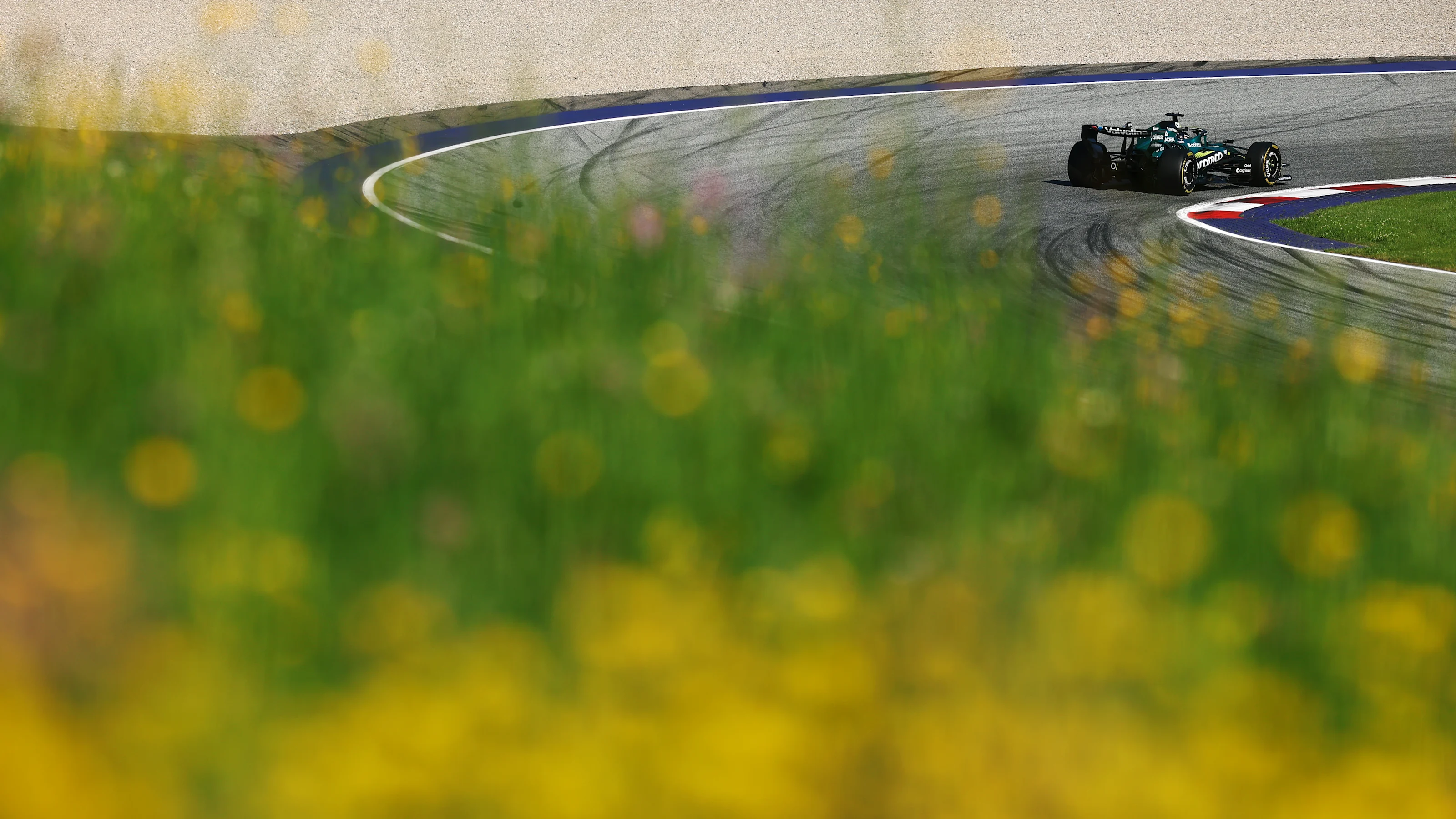 SPIELBERG, AUSTRIA - JUNE 26: Lance Stroll of Canada driving the (18) Aston Martin F1 Team AMR26
