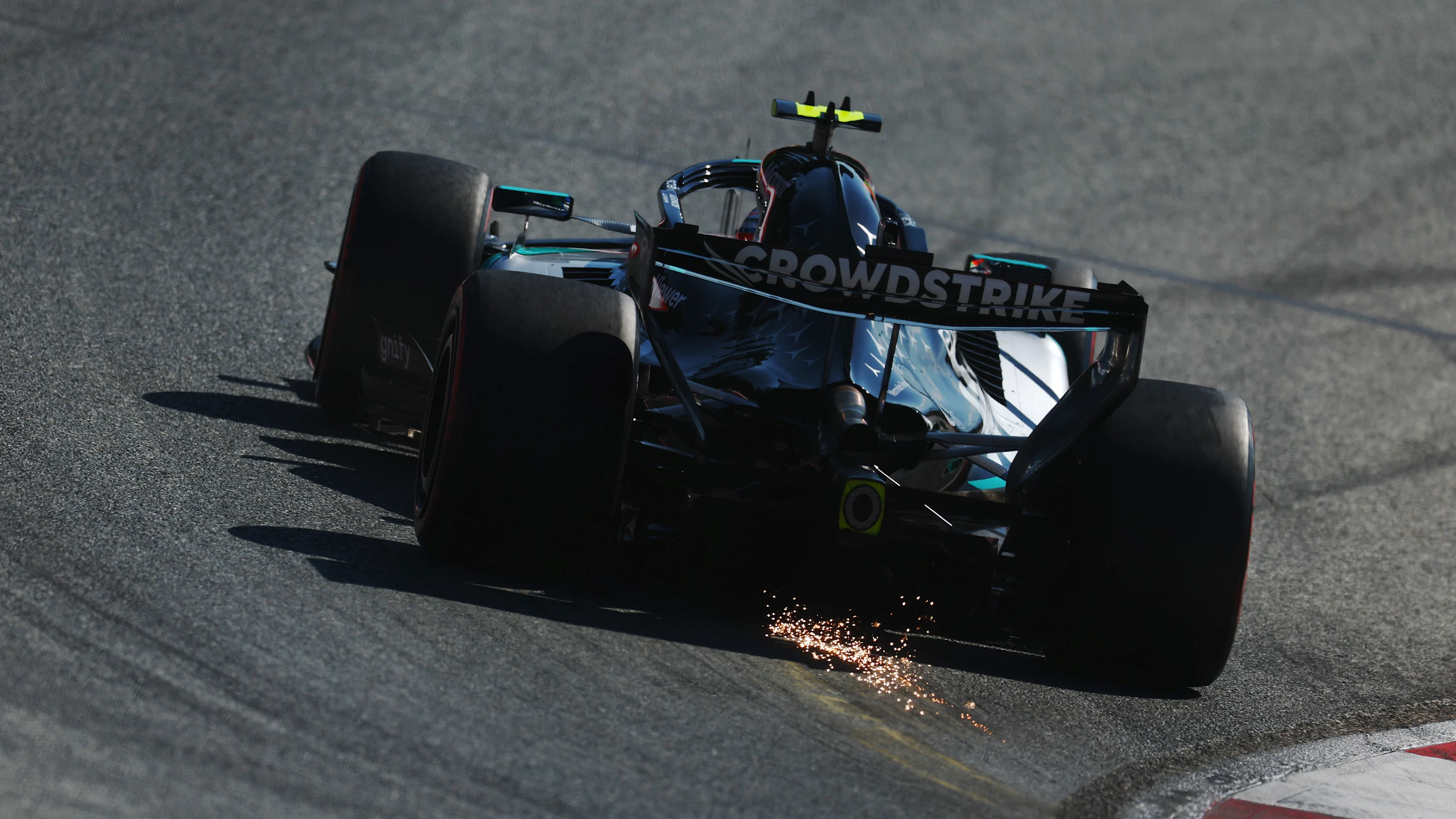 SPIELBERG, AUSTRIA - JUNE 27: Sparks fly behind Andrea Kimi Antonelli of Italy driving the (12)
